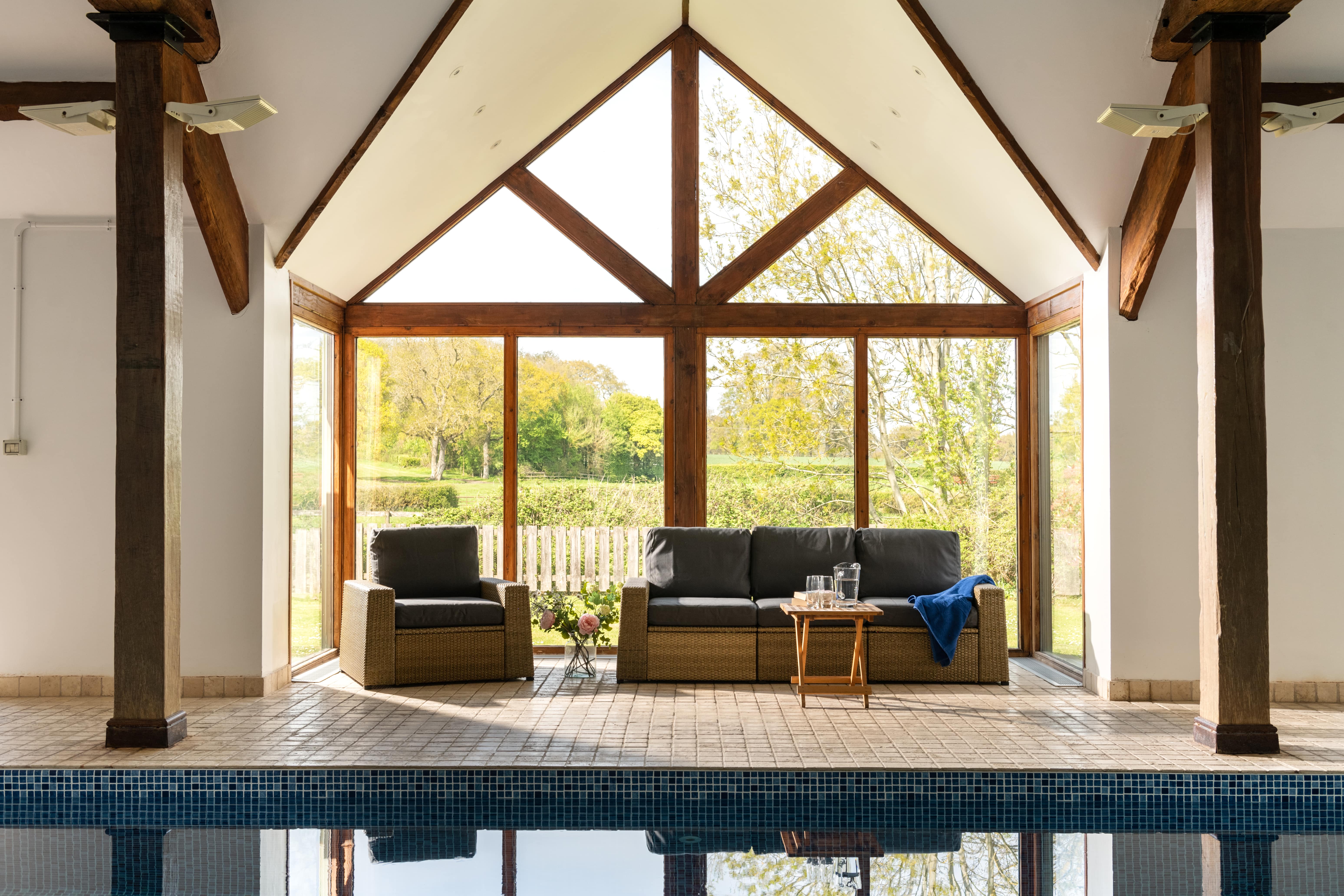 Allerford Barns - relax by the shared swimming pool