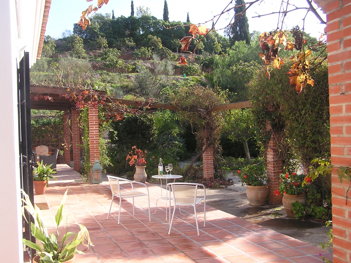 La Finca del Nino - part of haciendas lovely patio with views overlooking the garden and mango orchards