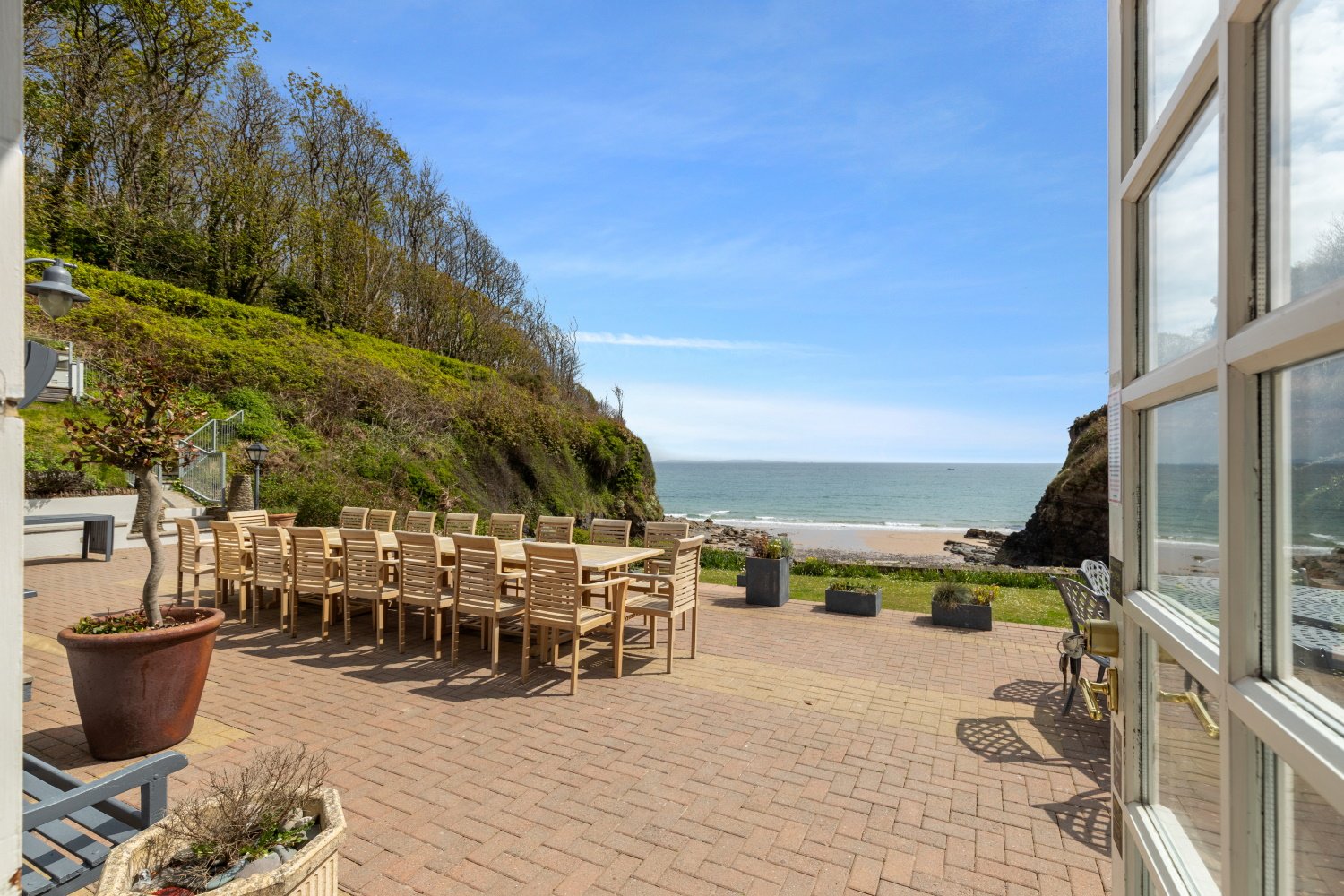 Waterwynch - outside dining on the patio with exceptional views