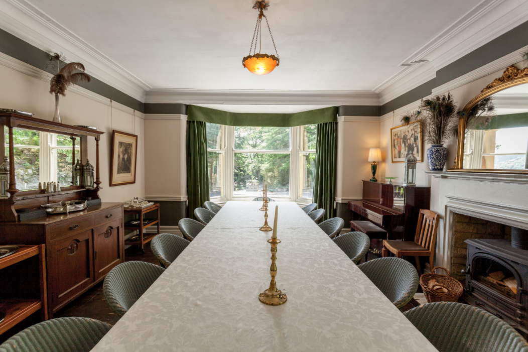 Comfortable dining for 18 guests around the bespoke 15ft oak table. There’s a wood burning stove to keep you warm and a piano to keep you entertained