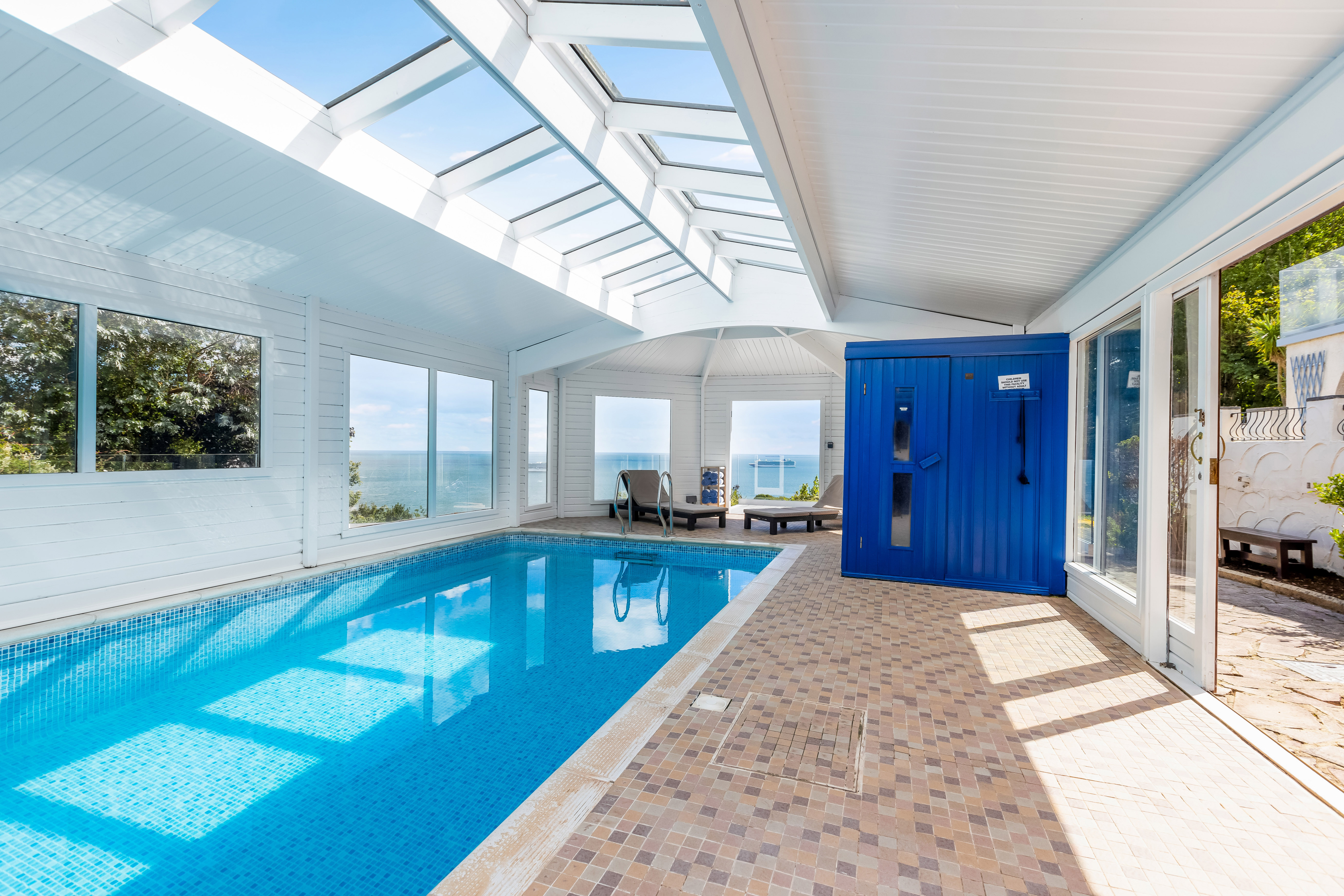 Cliff Lodge - stunning sea views from the covered swimming pool