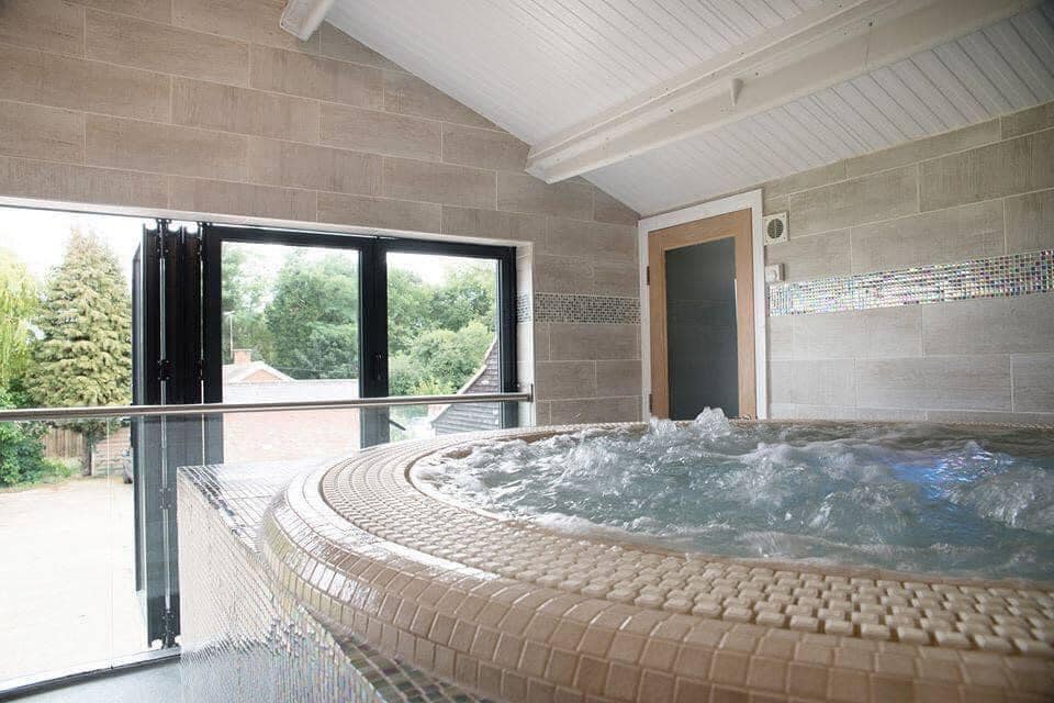 Creeksea Place Barns - large hot tub in the Saltmarsh Spa (Lex Fleming Photography)