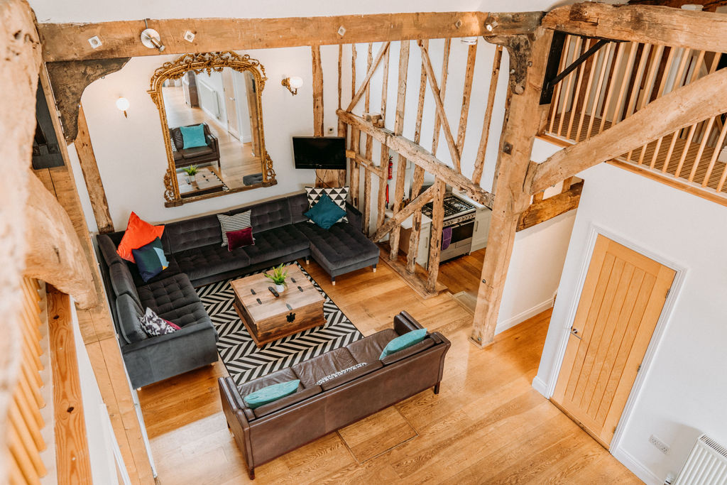 Creeksea Place Barns - looking down into the seating area in The Granary (Lex Fleming Photography)