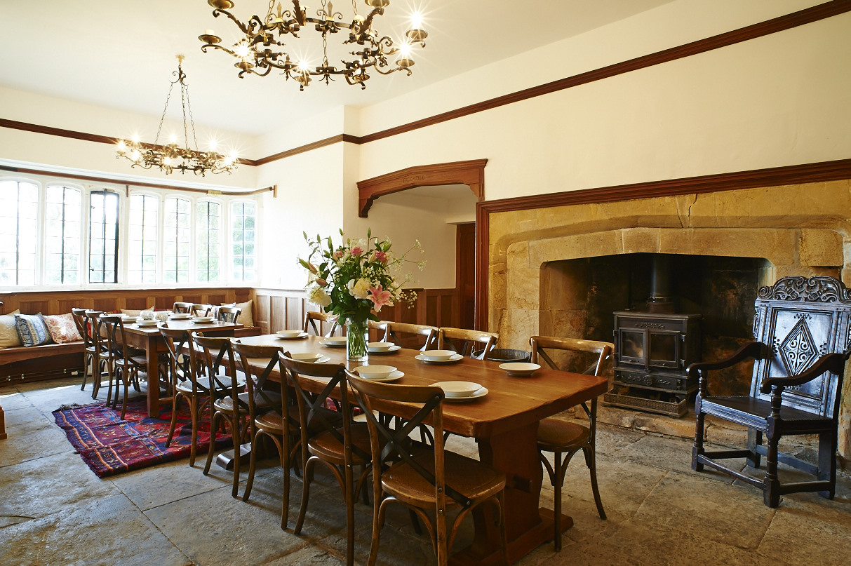 Primrose Manor - formal dining in room next to wood stove