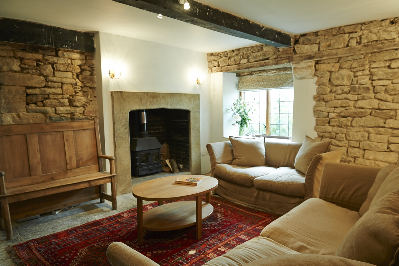 Primrose Manor - relaxed seating next to another wood burning stove