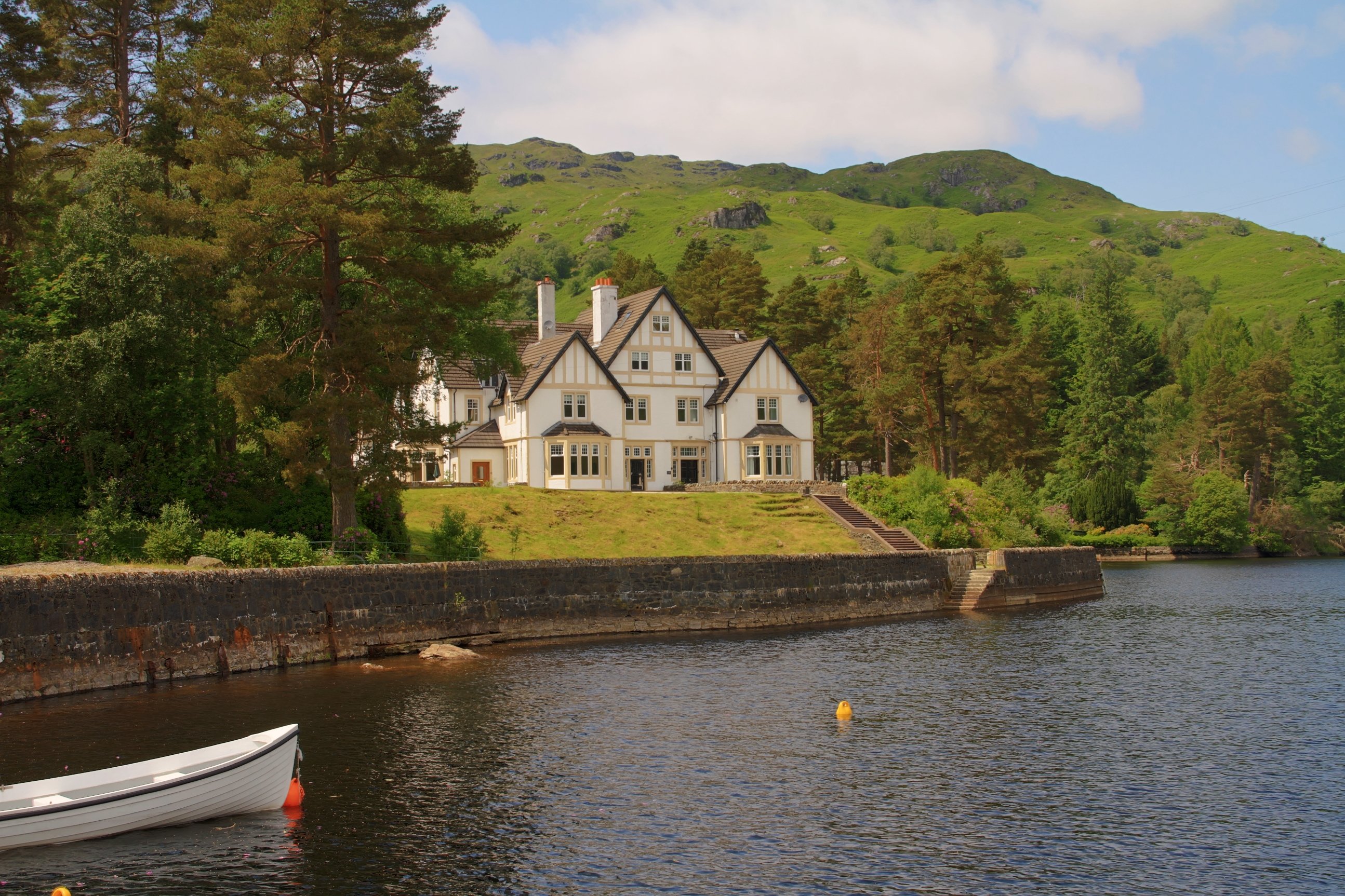 Stronachlachar Lodge - the view of the house from the loch