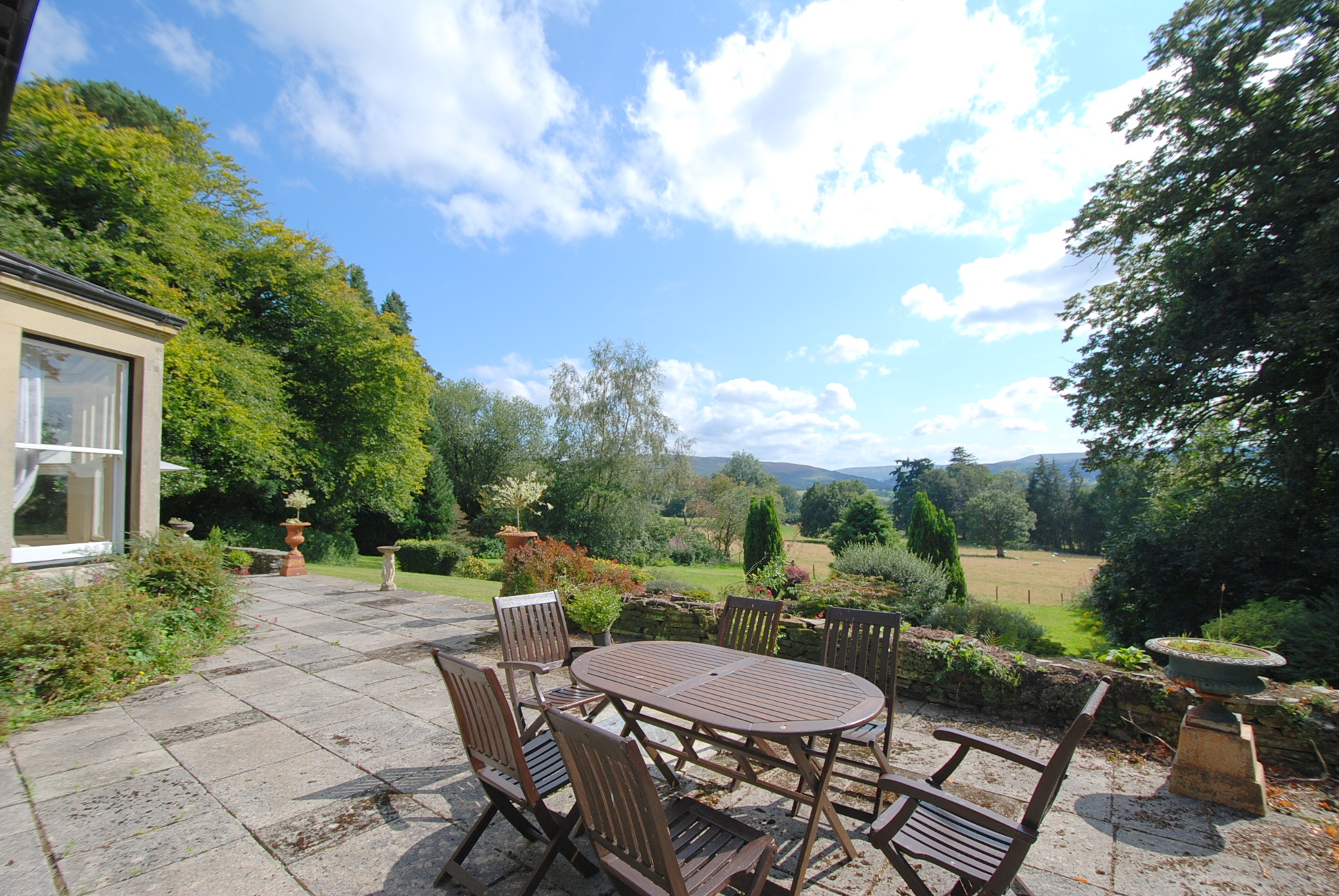Cefnfaes Hall - a lovely spot on the terrace for morning coffee taking in the views