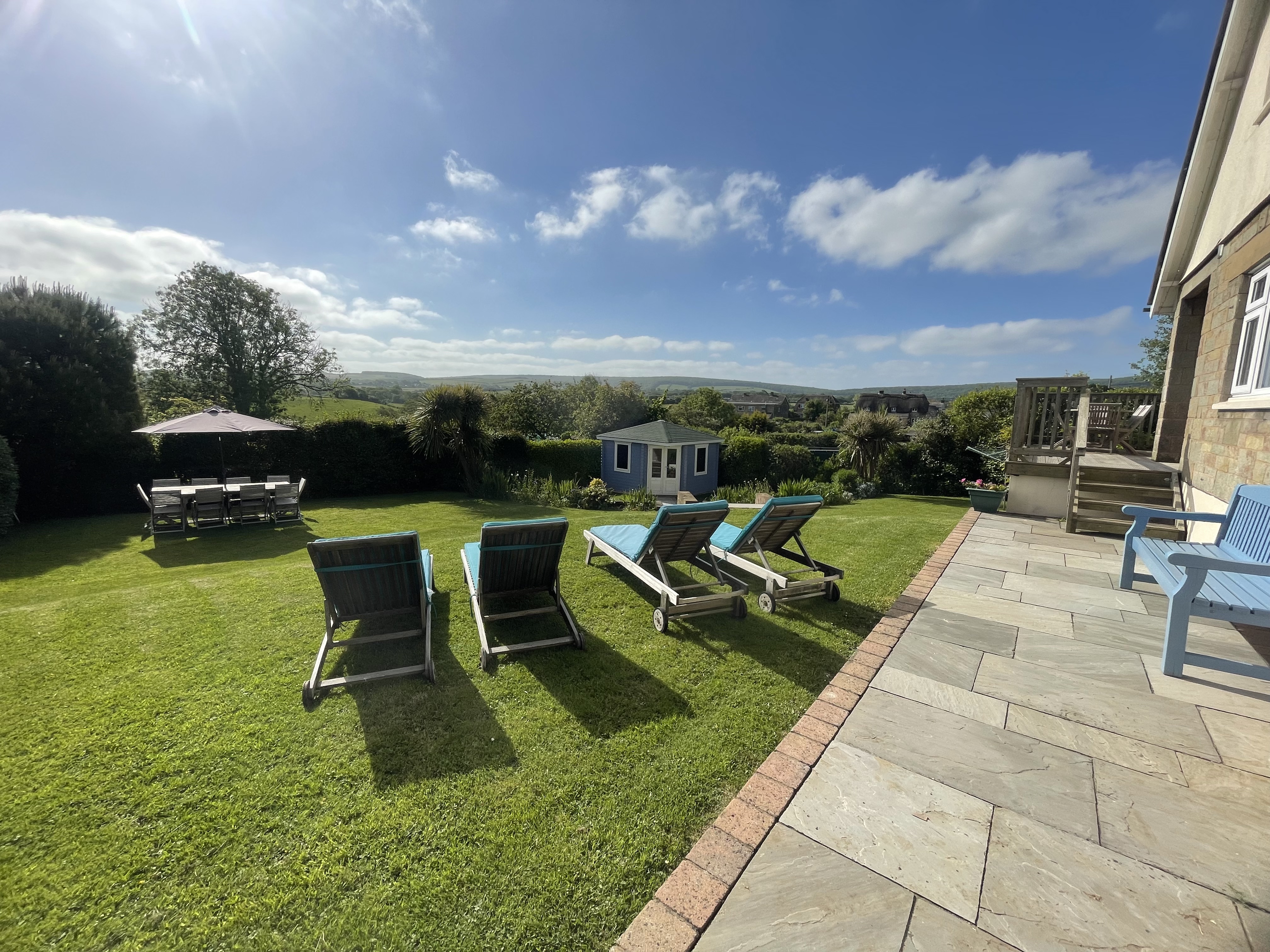 Three Gables - relax in the garden on loungers