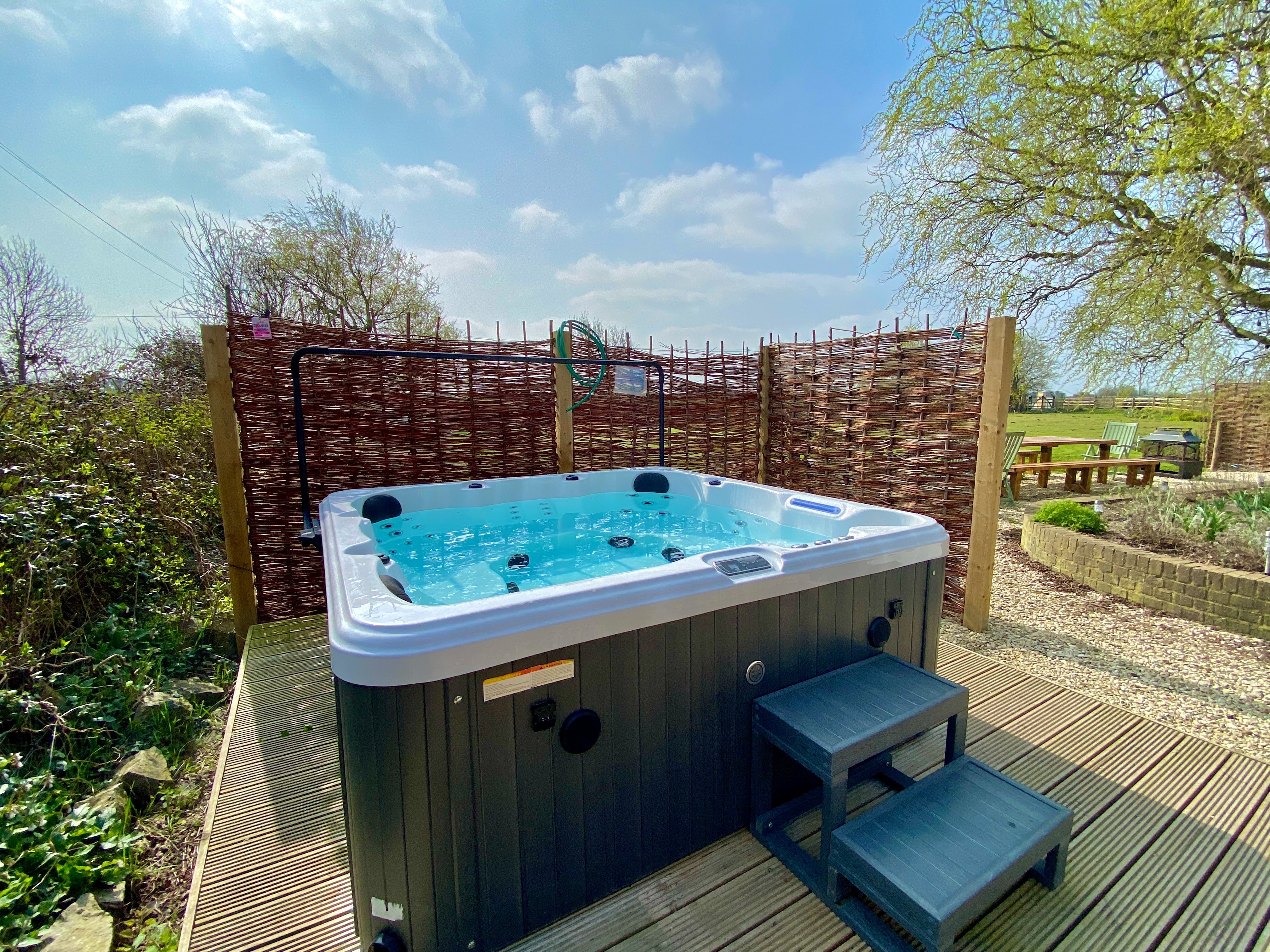 Fantastic hot tub at the farmhouse with lights, jets and music.