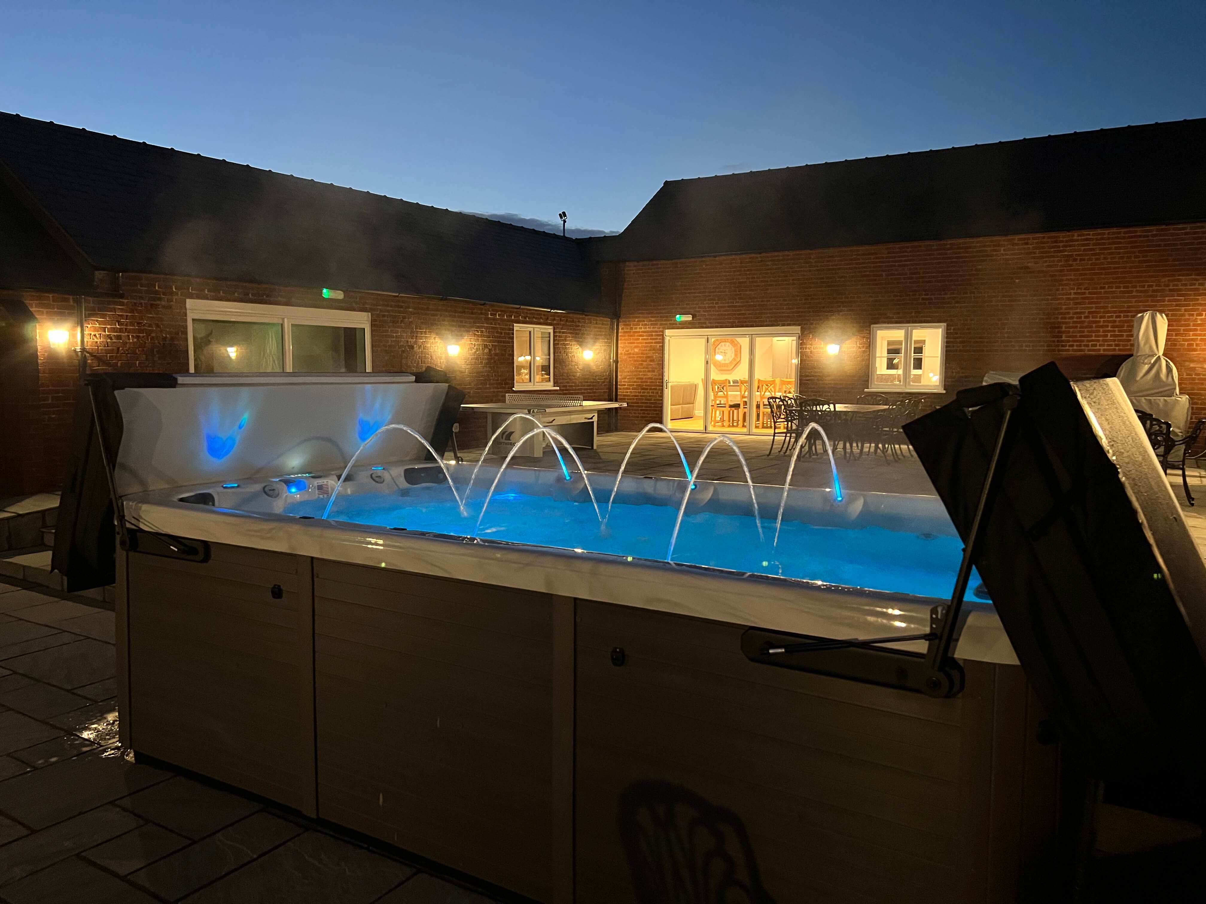 Brockdale Barn - luxury swim spa lit up