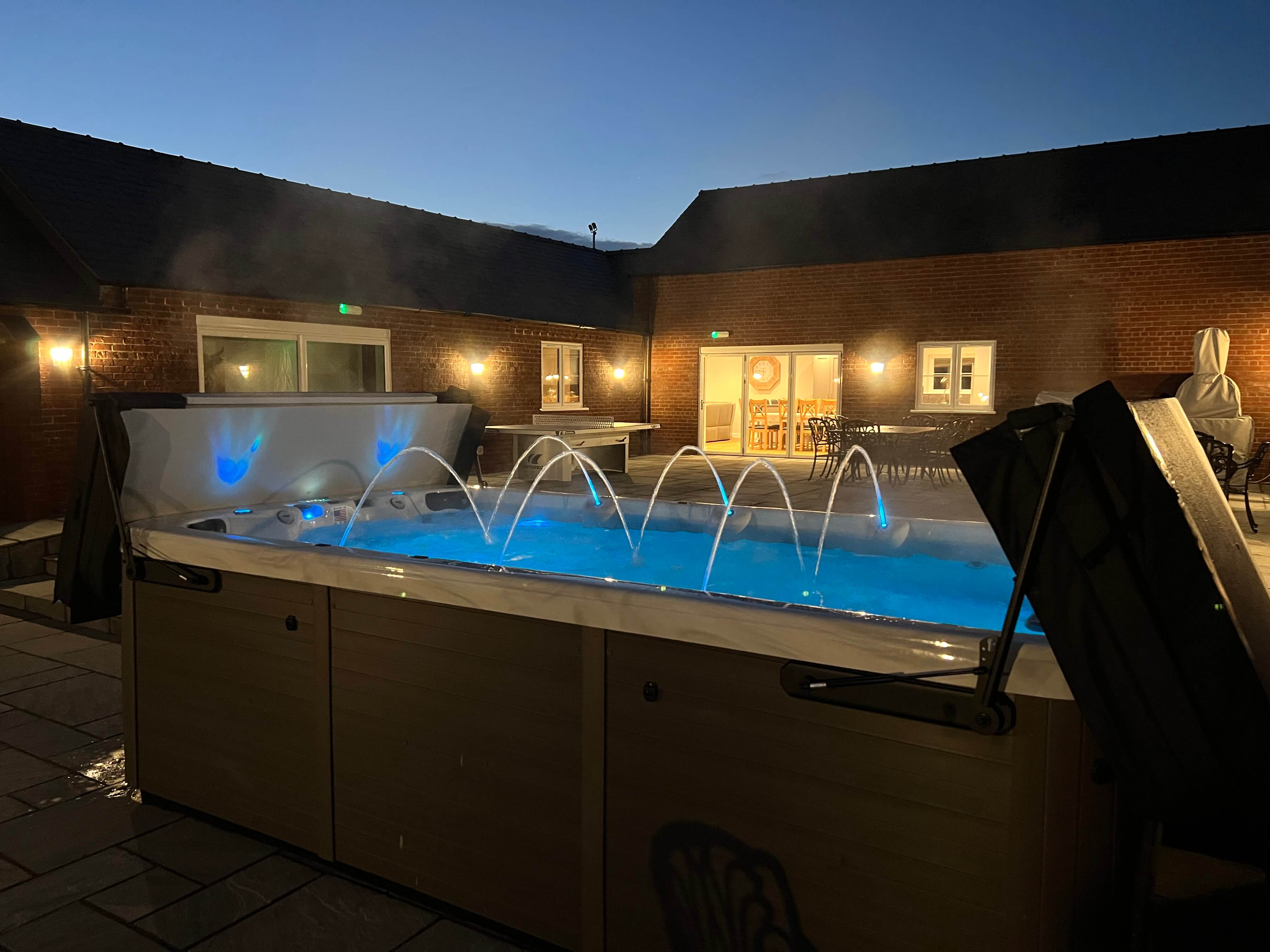 Brockdale Barn - luxury swim spa lit up