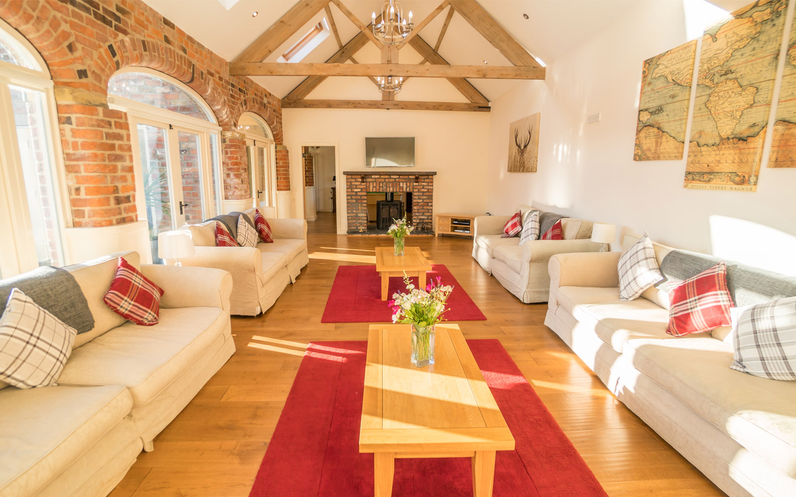 Foldyard House - vaulted ceiling in long lounge with wood burner