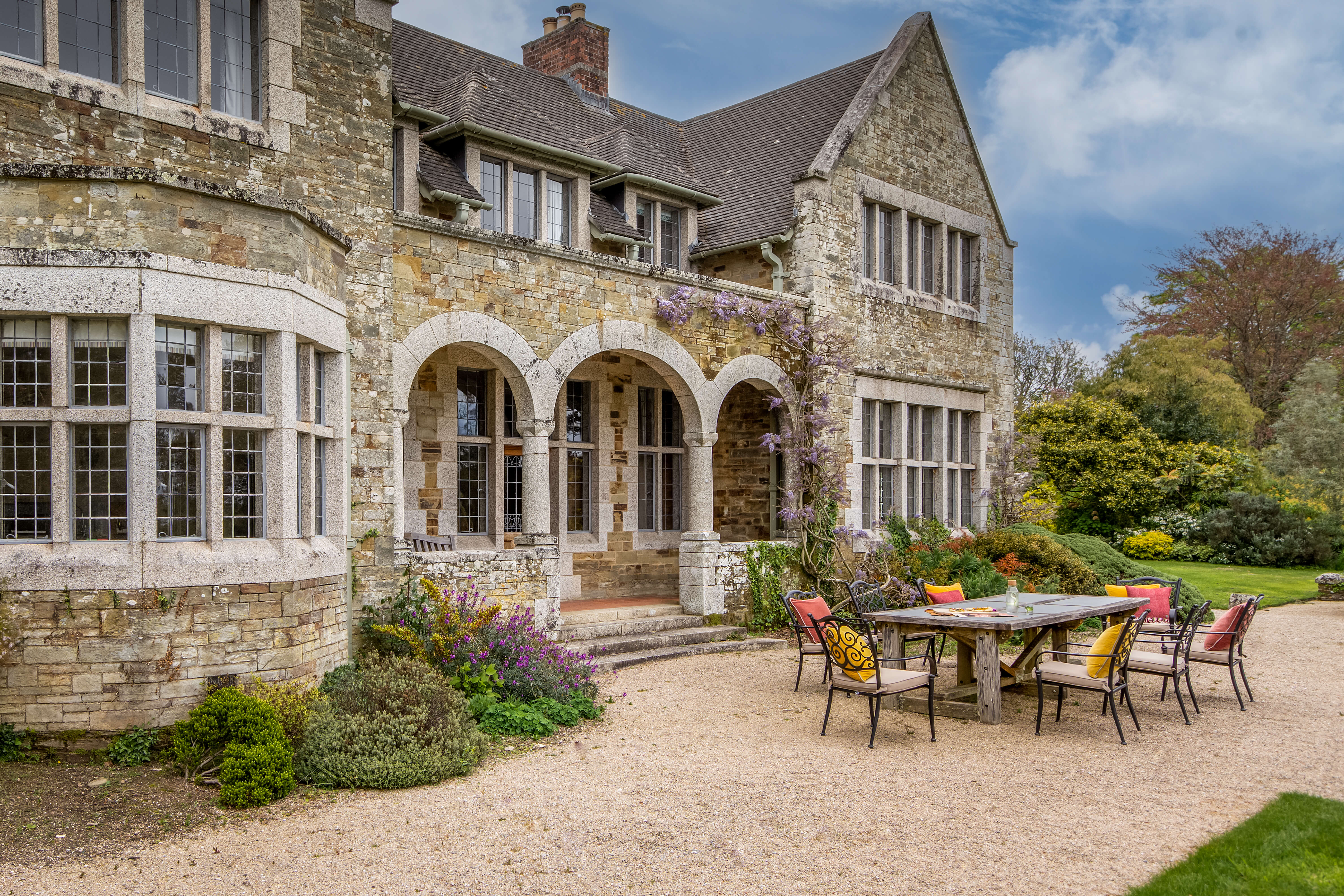 National Trust - Bosveal - outdoor seating area with views over the grounds