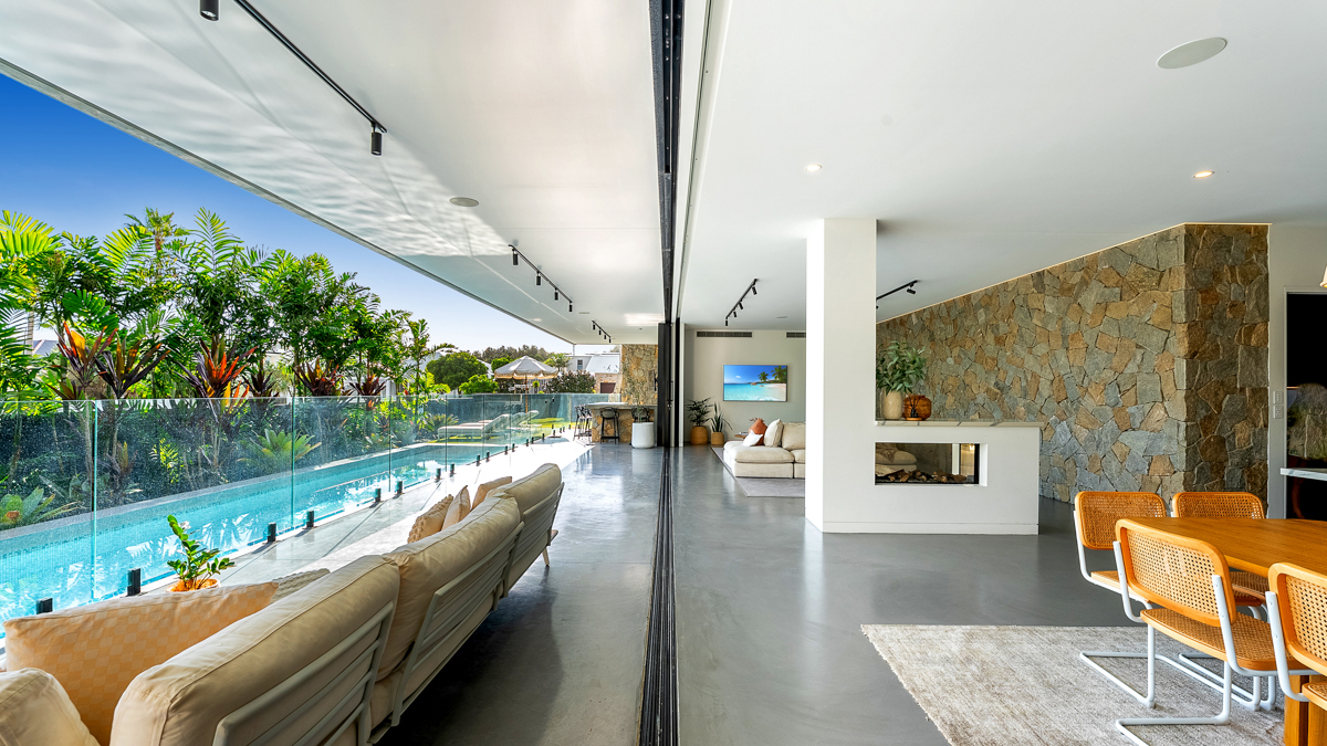 Mana Beach House - glass sliding doors allow seamless indoor and outdoor living