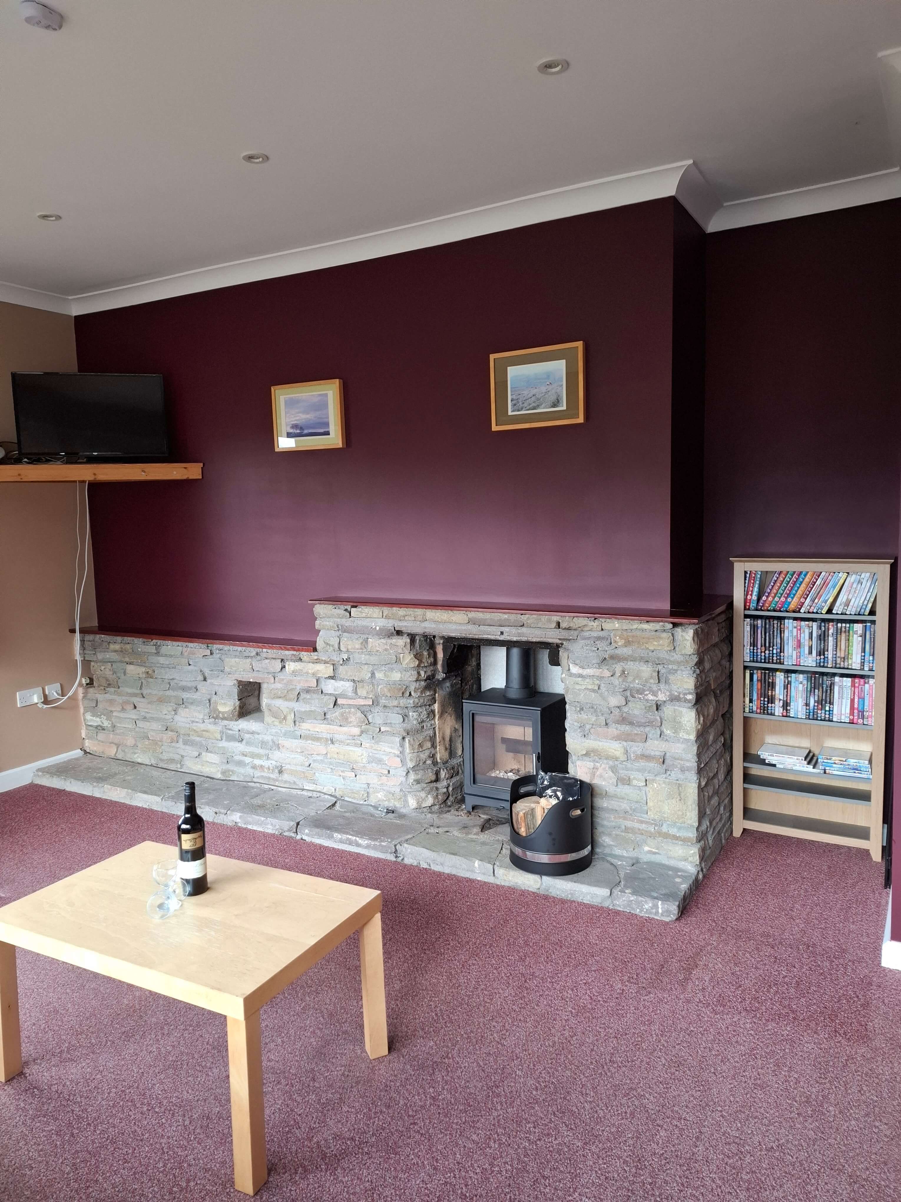 The Firs at Pendarren House - sitting room with a wood burner