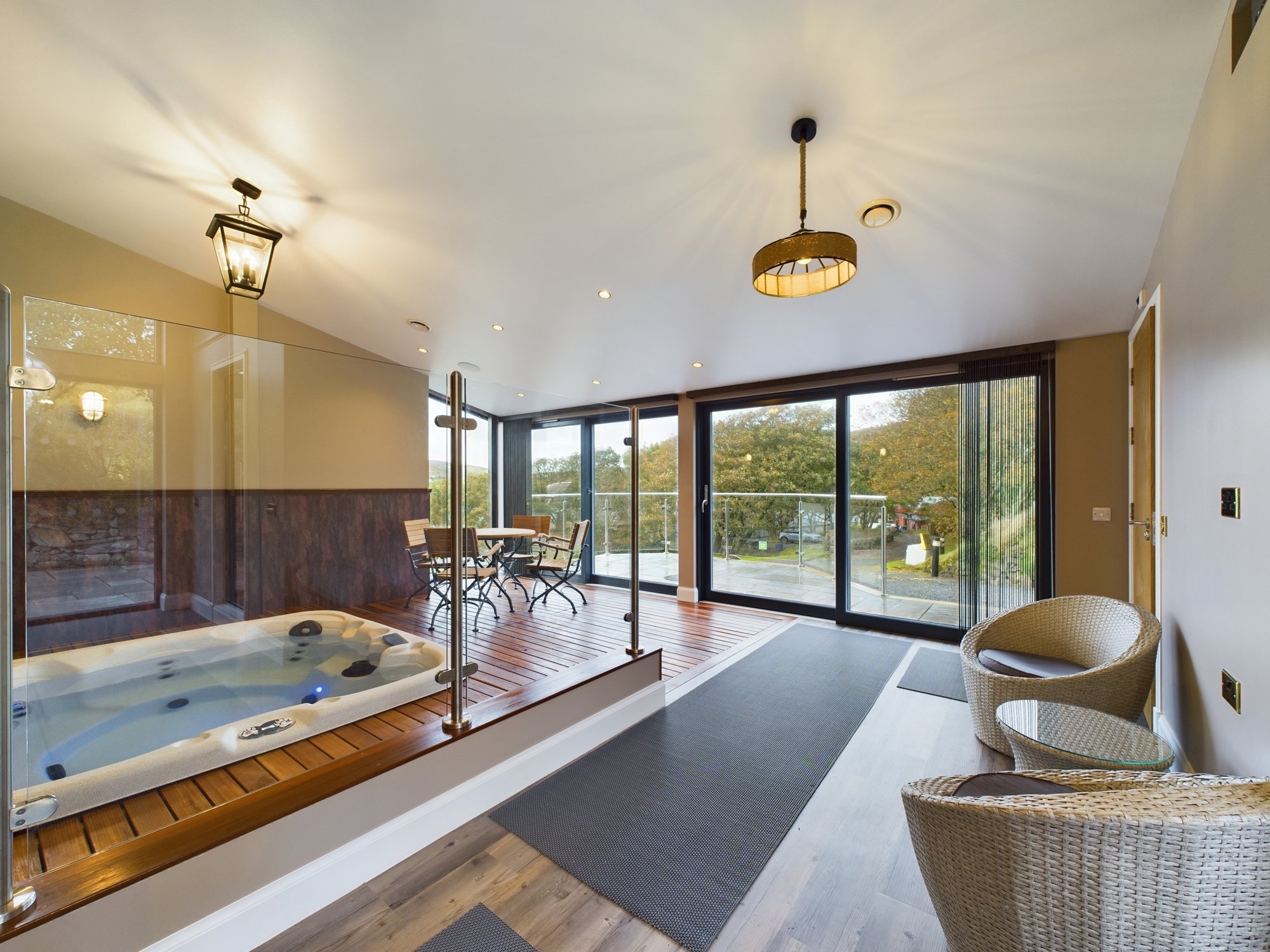 Voe House - spa with doors to patio and views of Voe