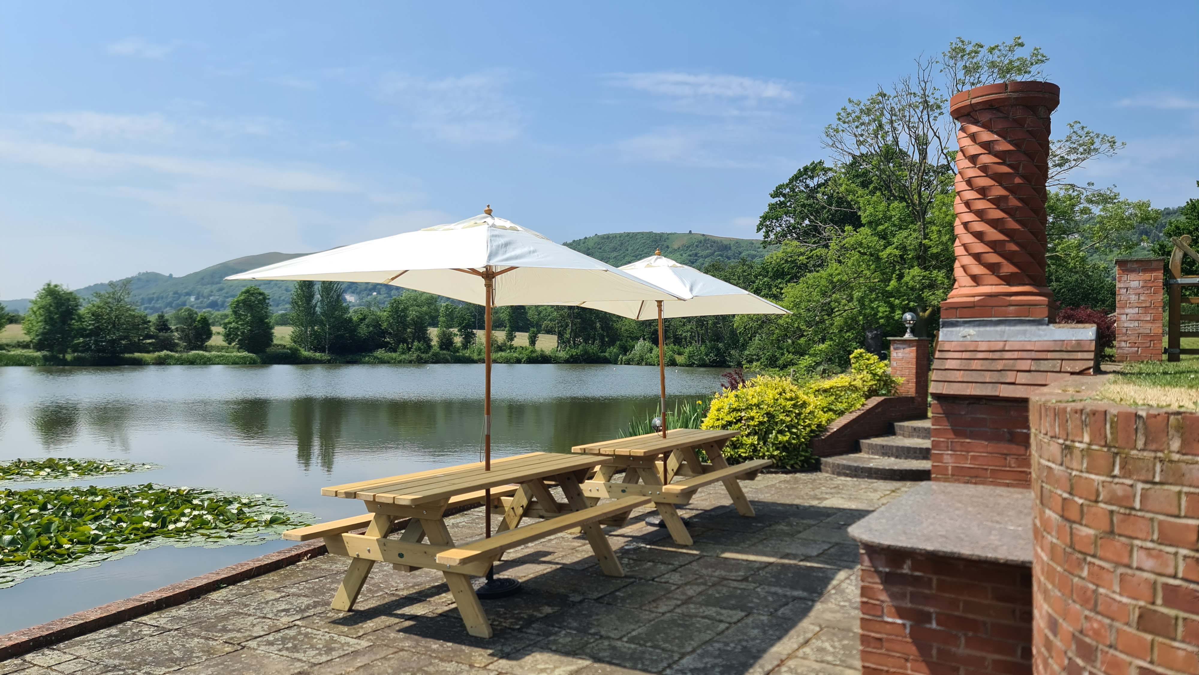 The Lake House - outside seating by the lake