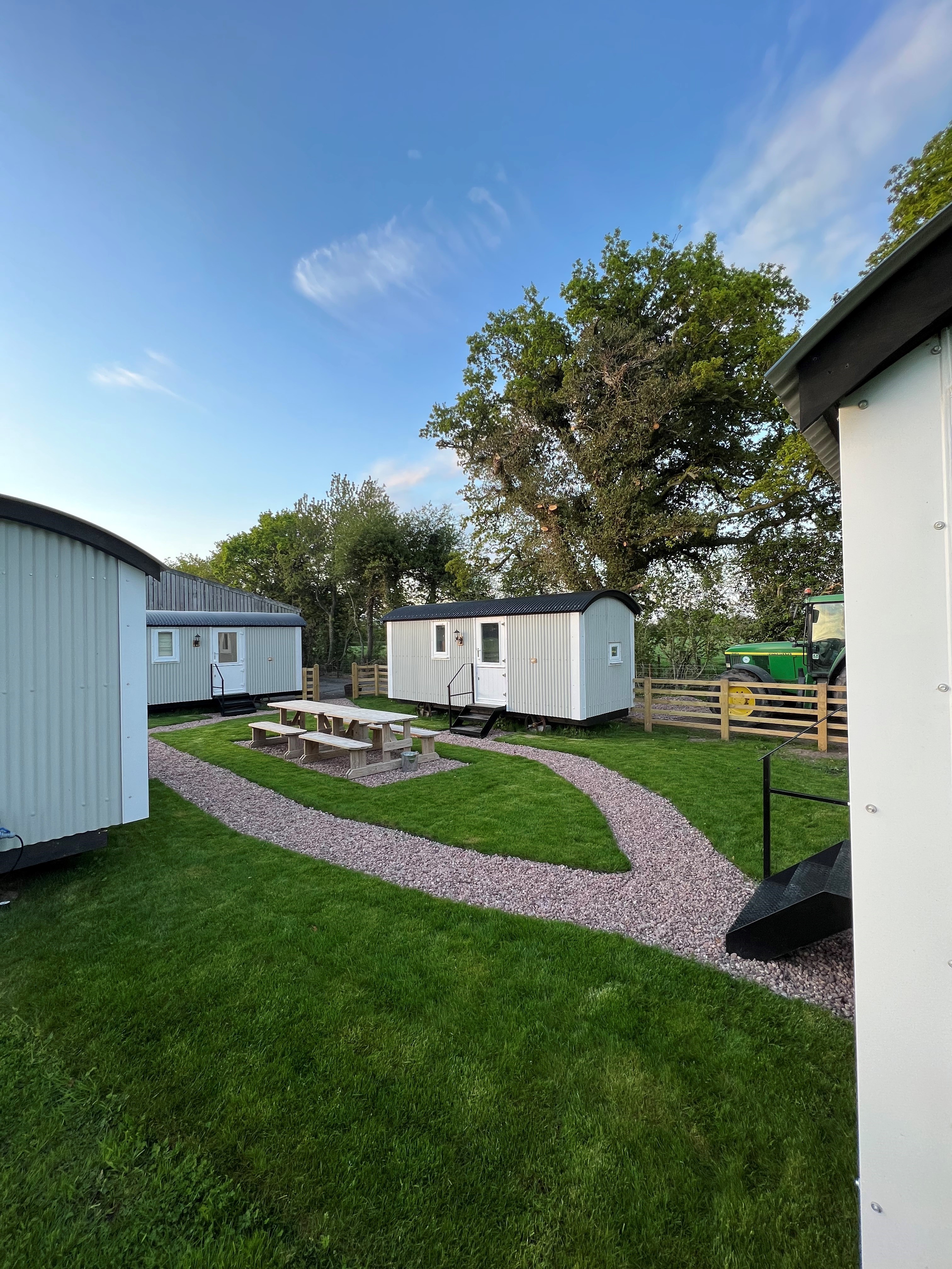 Farm Adventure Shropshire - lovely shepherds' huts with central picnic benches
