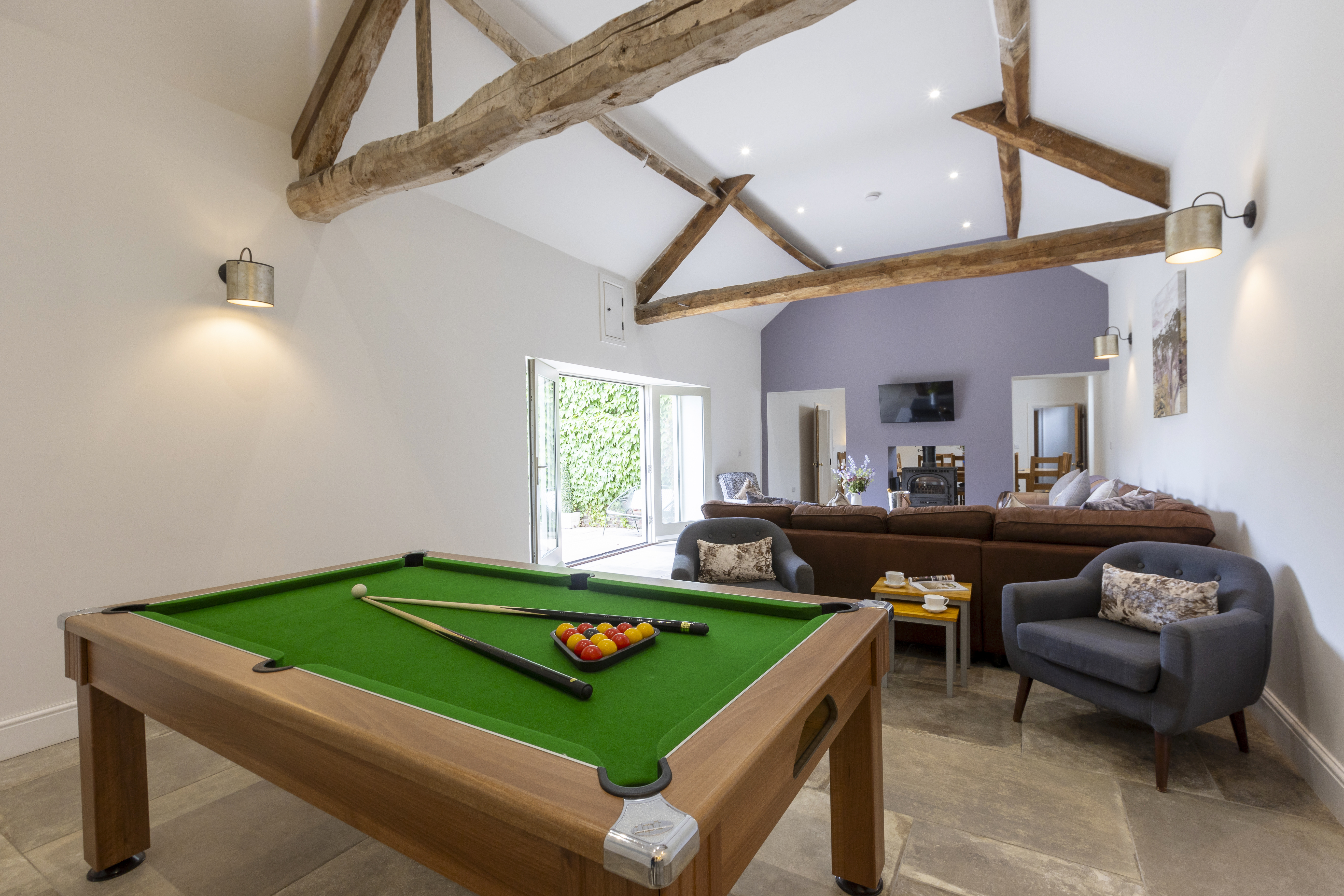 Corner Farm Malton - pool table and seating in the games room