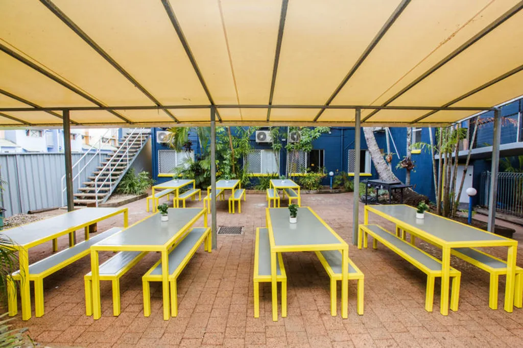 Mad Monkey Village - shaded outdoor seating area