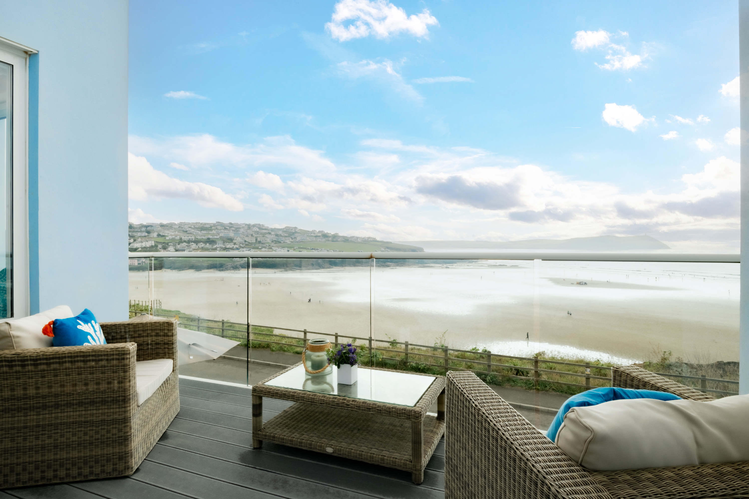 Tristram - early morning coffee on the balcony overlooking the beach
