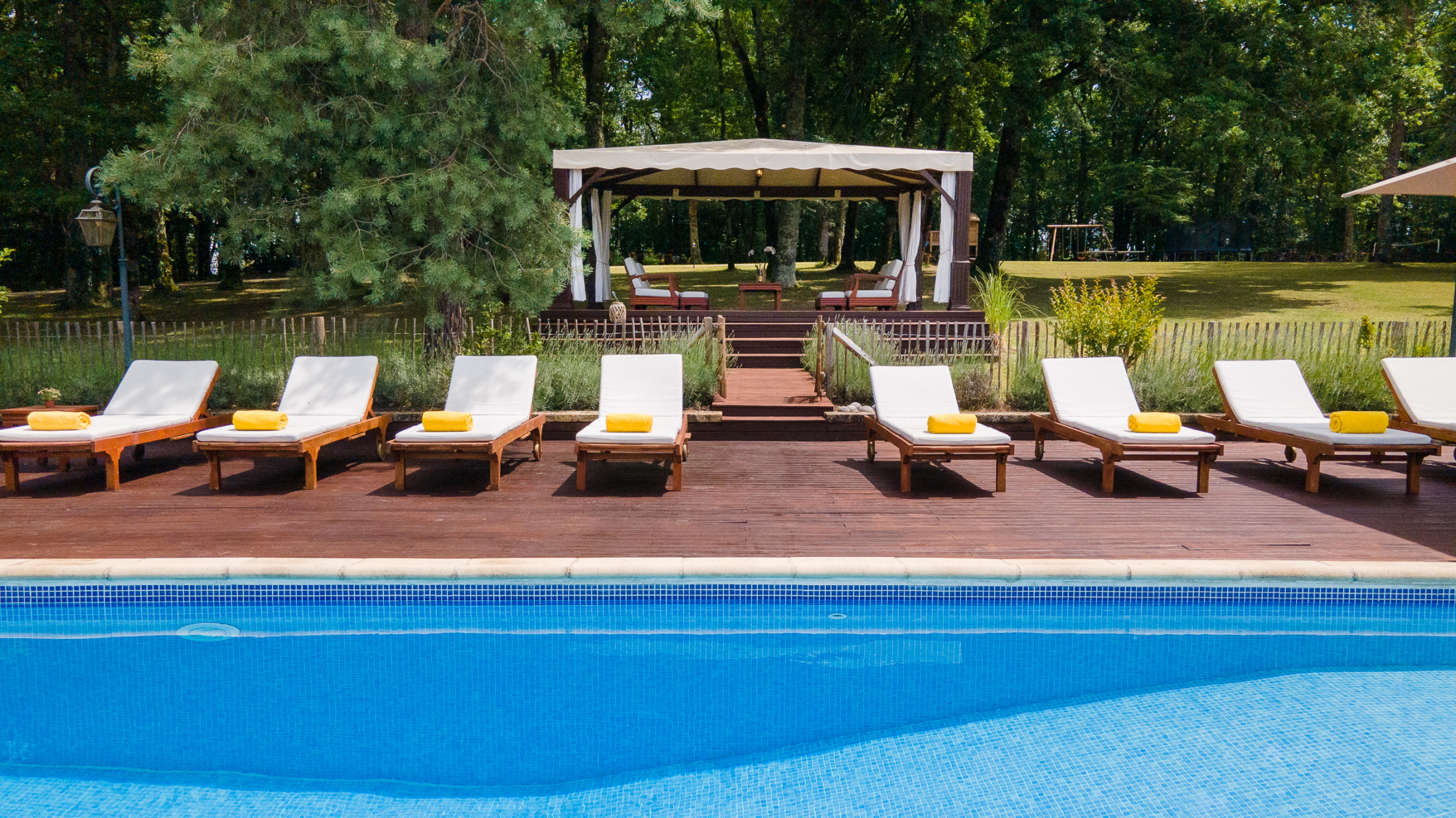 Chateau la Carriere- loungers and gazebo next to the pool