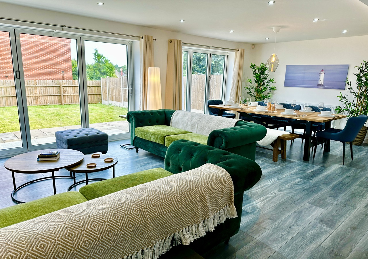 The Big Cosy - open plan design lounge with access to the garden
