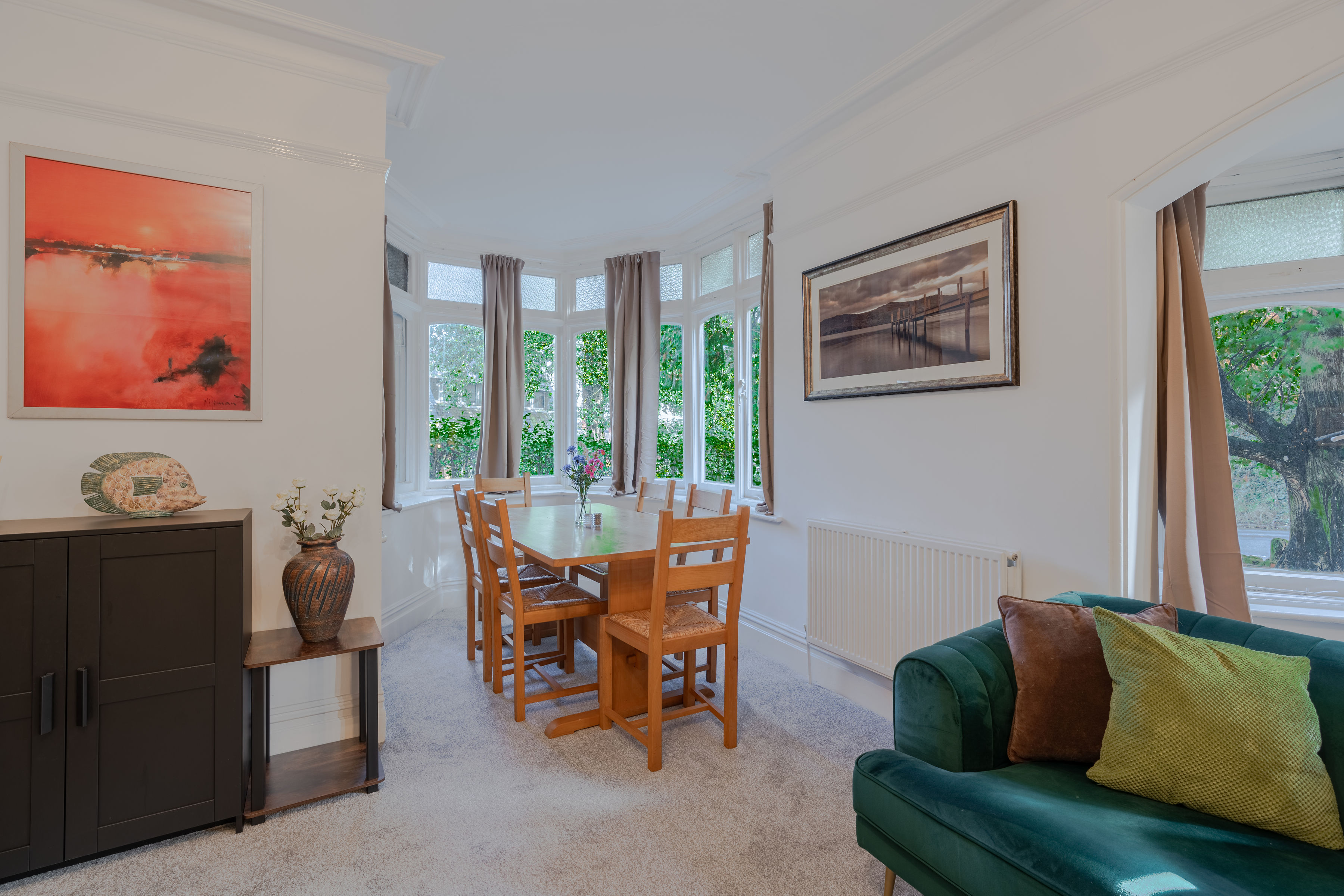 The Bloxham House - dining area with bay window giving plenty of light