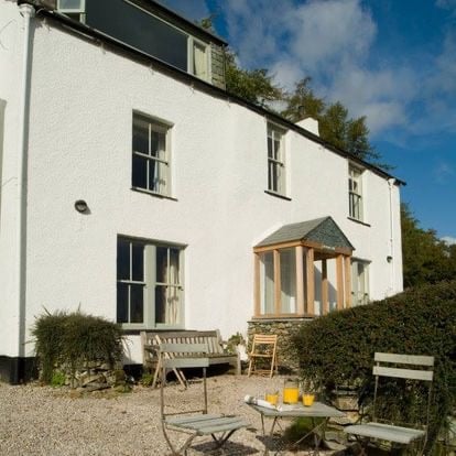 Rowling End House - external view with outdoor seating