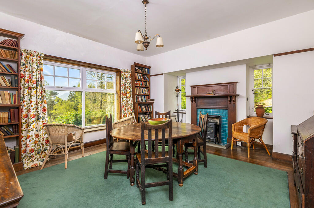 The Coppice - dining room with multifuel stove