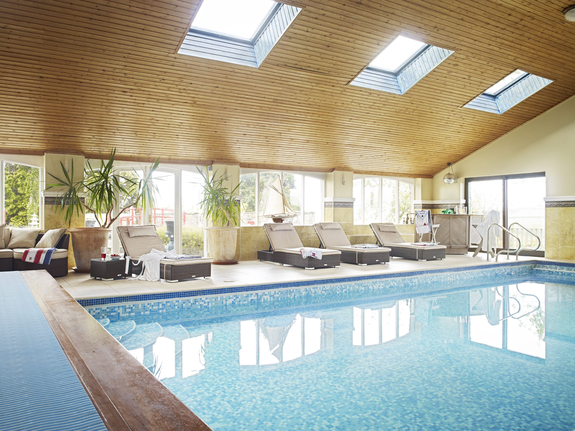 Ludbrook Manor - indoor heated pool with loungers and mood lighting