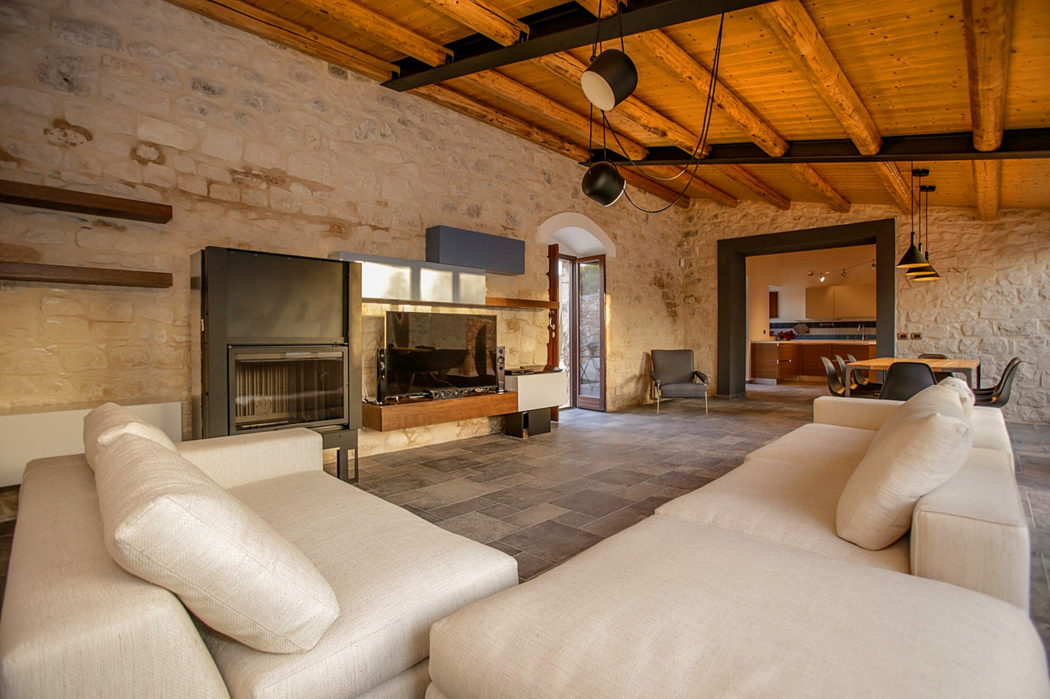Casa Salina - huge lounge with wood beamed ceiling, TV and fireplace