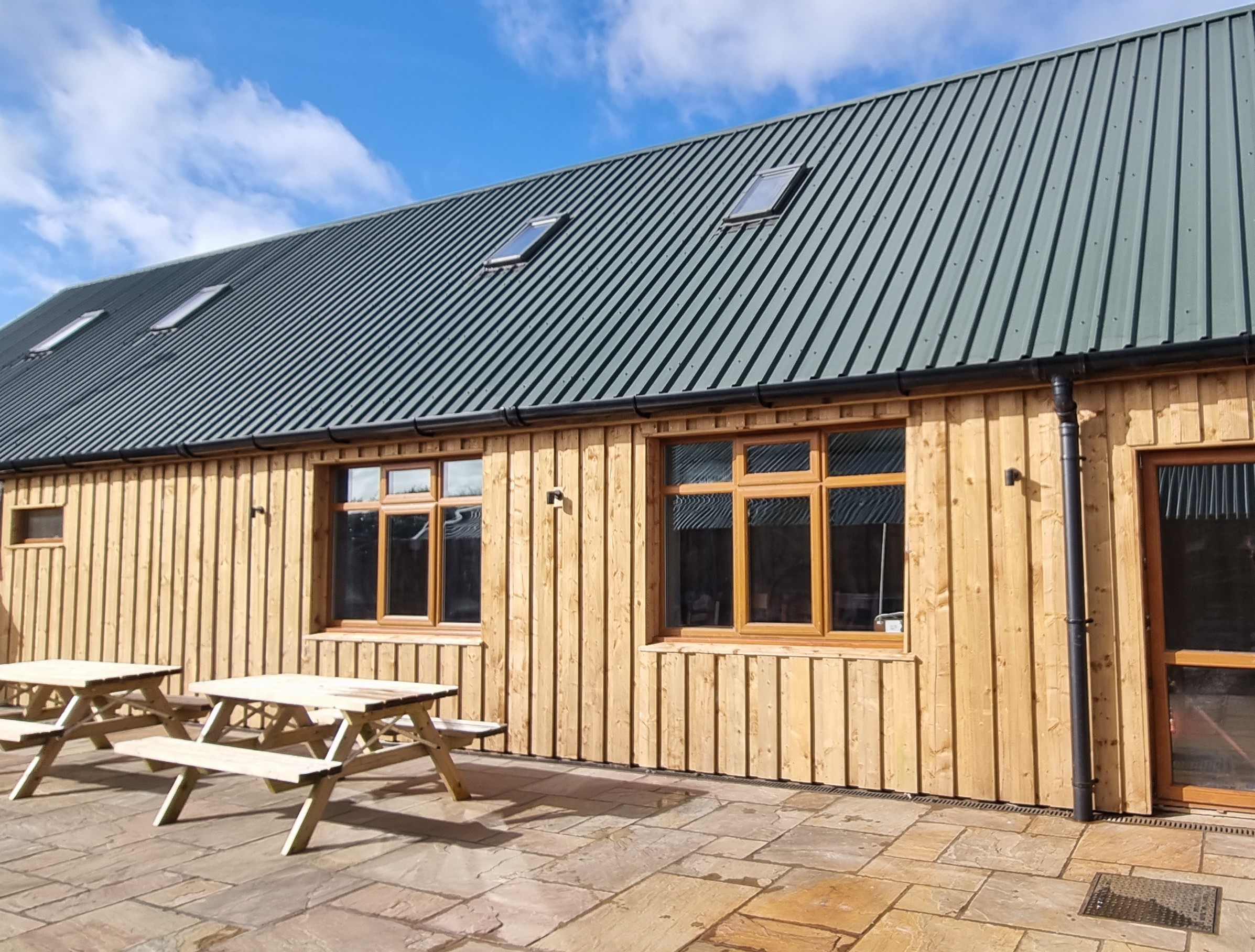 The Roaches Bunkhouse - external view with picnic benches
