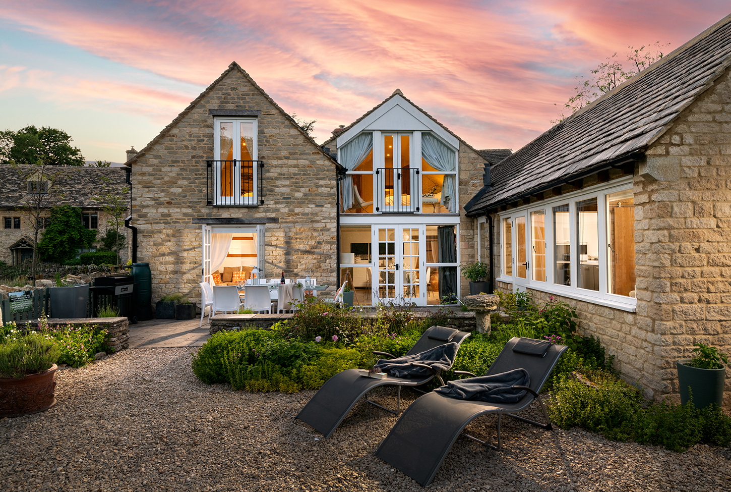 The Chestnuts - glorious enclosed garden with dining area and loungers