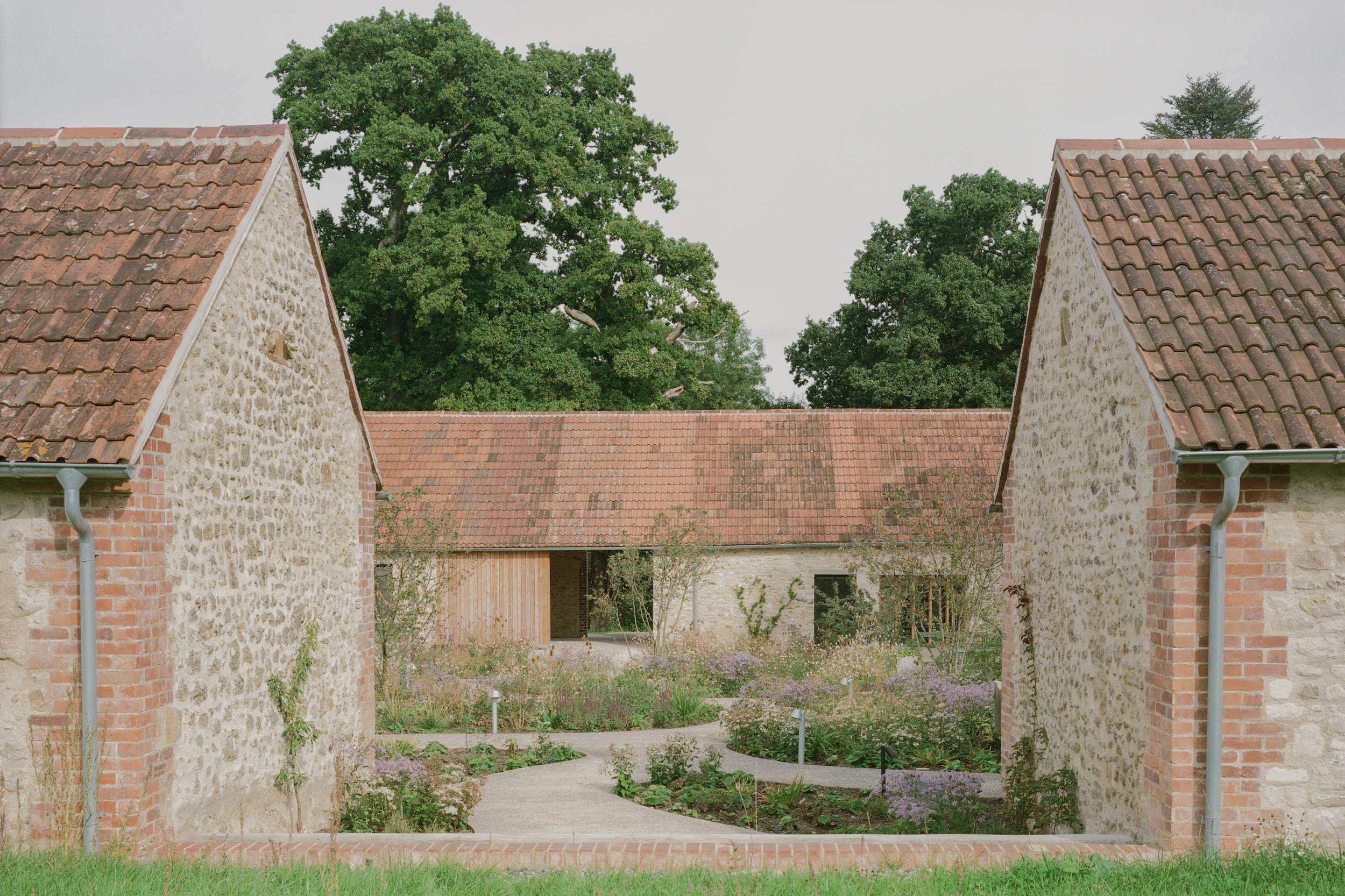 Wraxall Yard - shared courtyard garden between cottages