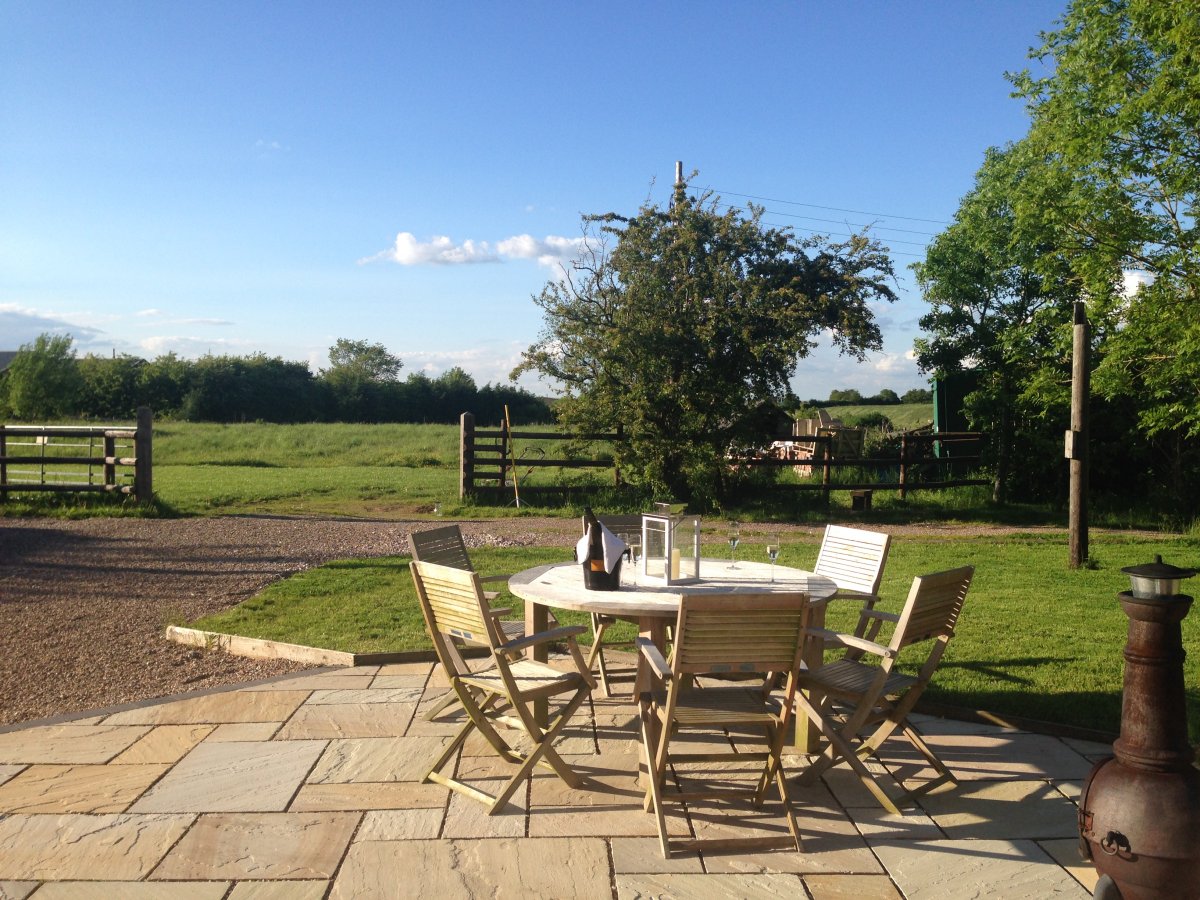 Private patio area overlooking the field