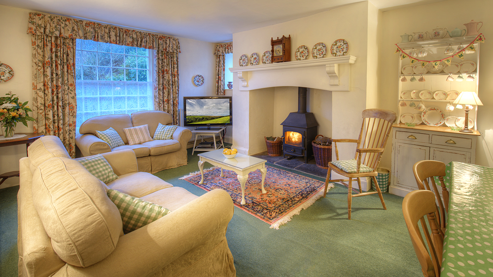 Sitting/breakfast room adjacent to the kitchen - wood burner.