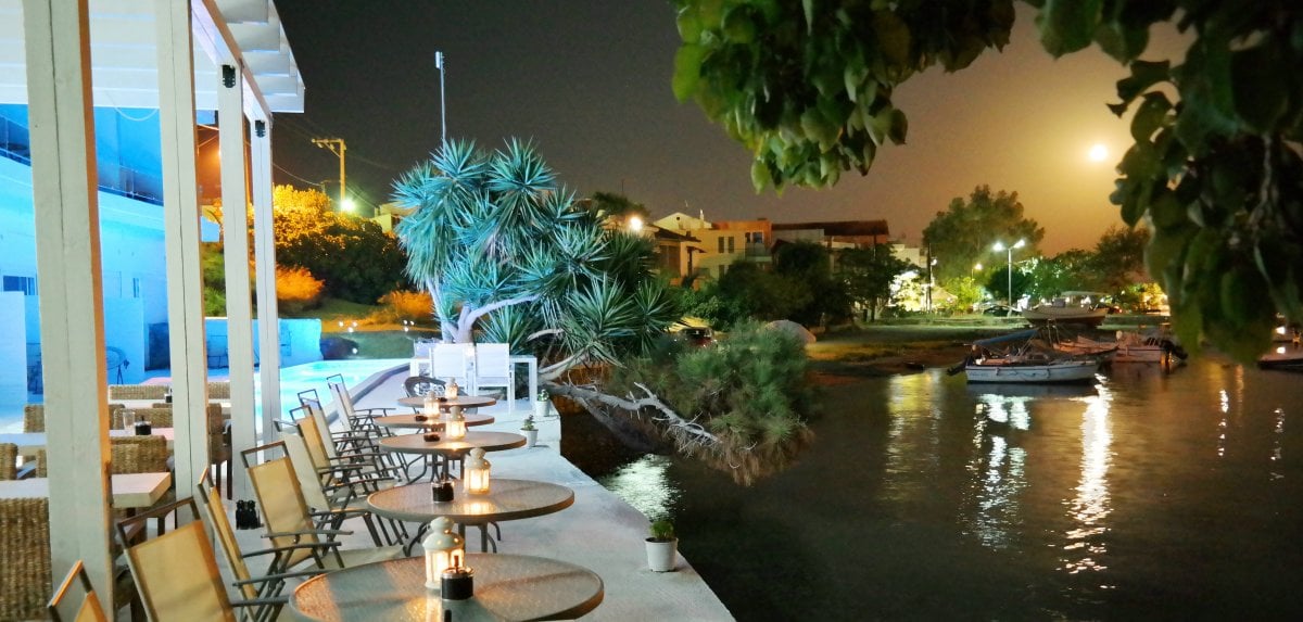 Dine overlooking the boats of this fishing village