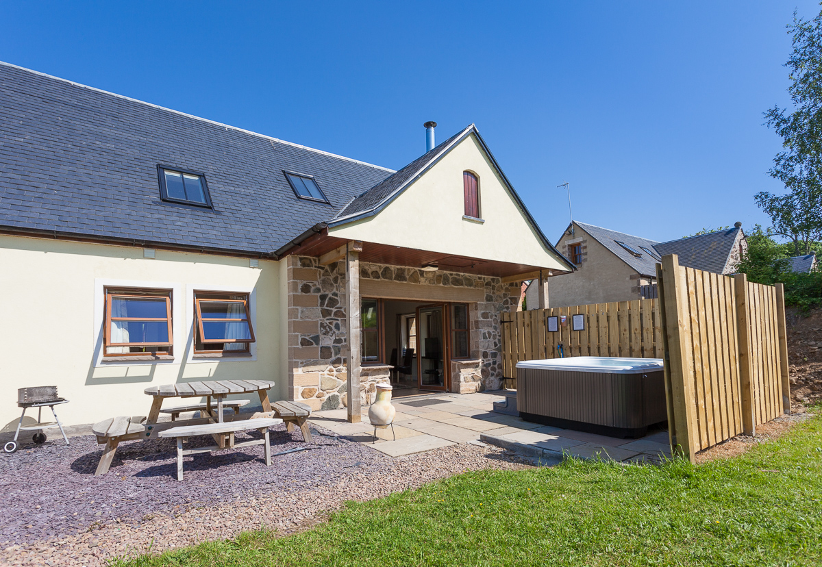 Each cottage enjoys a hot tub and outdoor seating