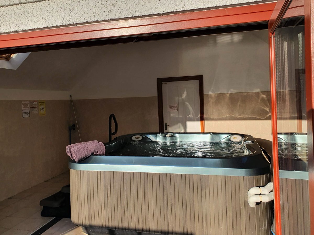 Unwind in the Jacuzzi hot tub seating 8