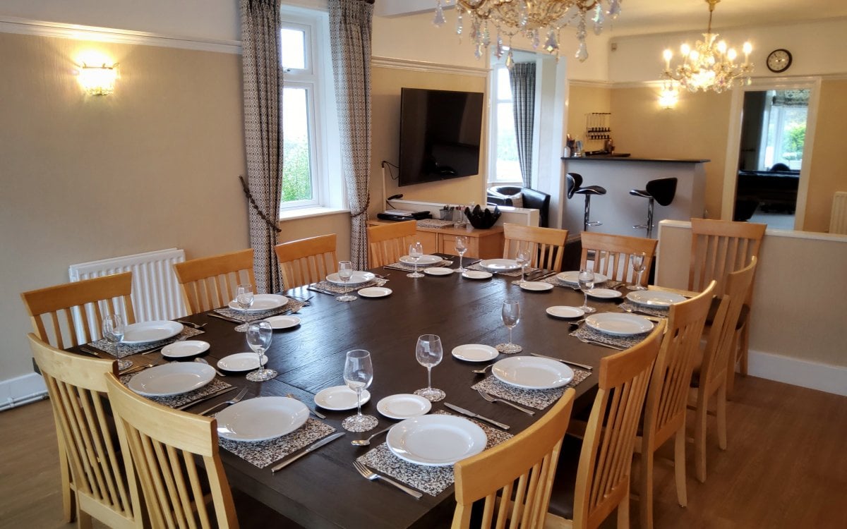 Spacious dining area seating up to 20 people