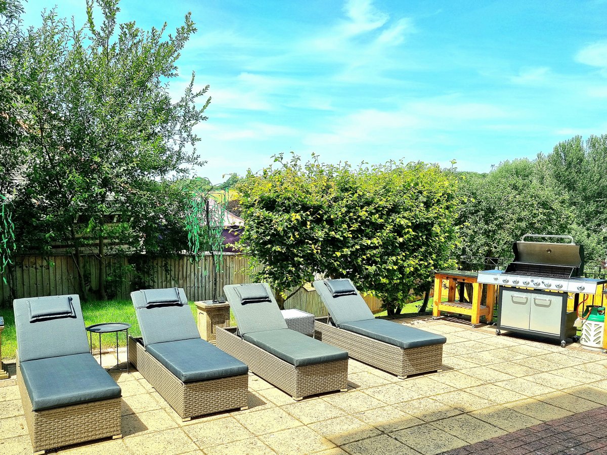 Cross Park House - sun loungers and barbecue