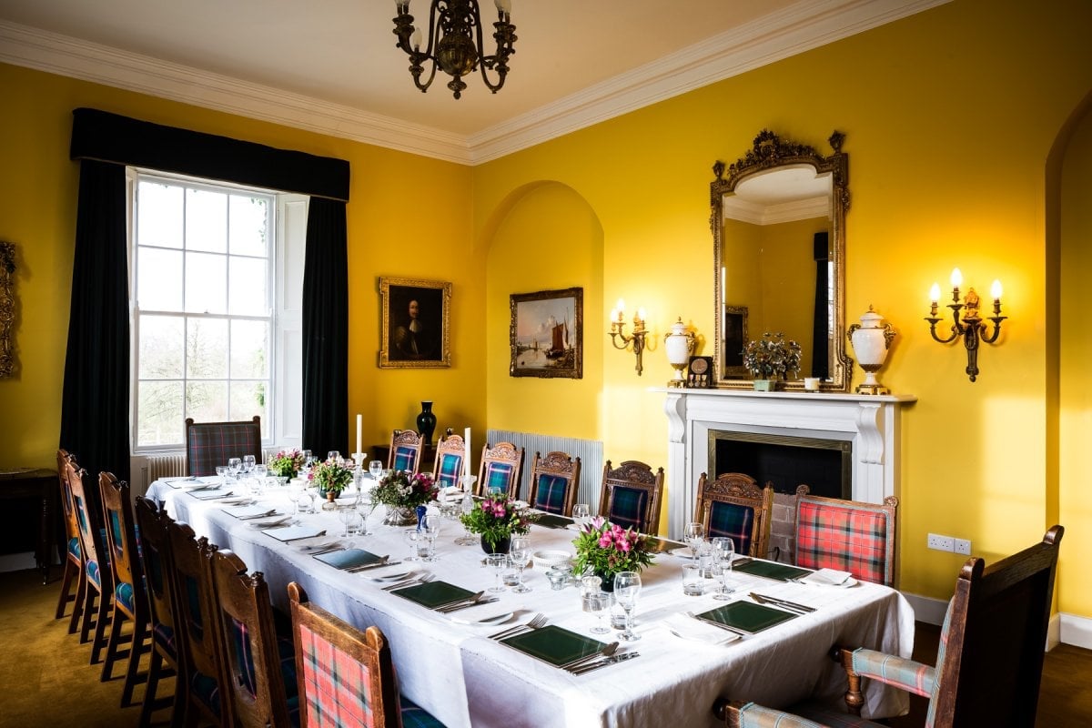 The dining room seats 20 max, with antique furniture and caterers if required