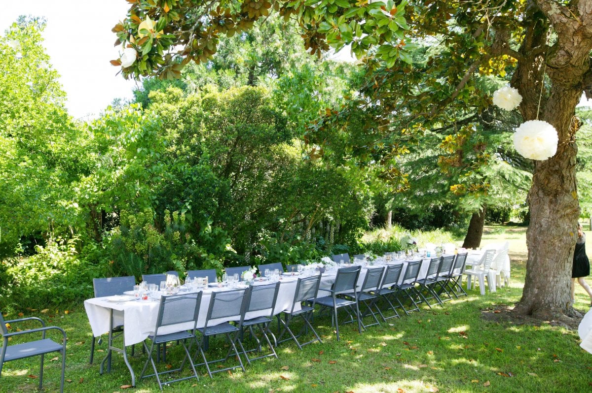 Set up group table in the garden of the Magnolia