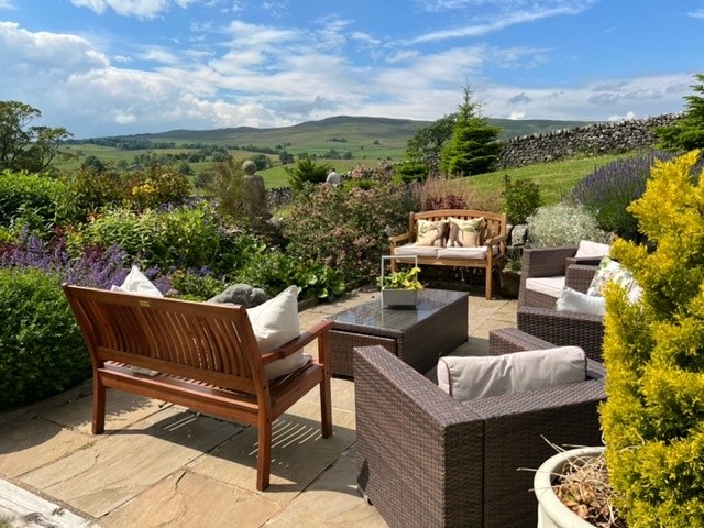 Flatt House Barn - outside seating area with amazing views over the valley