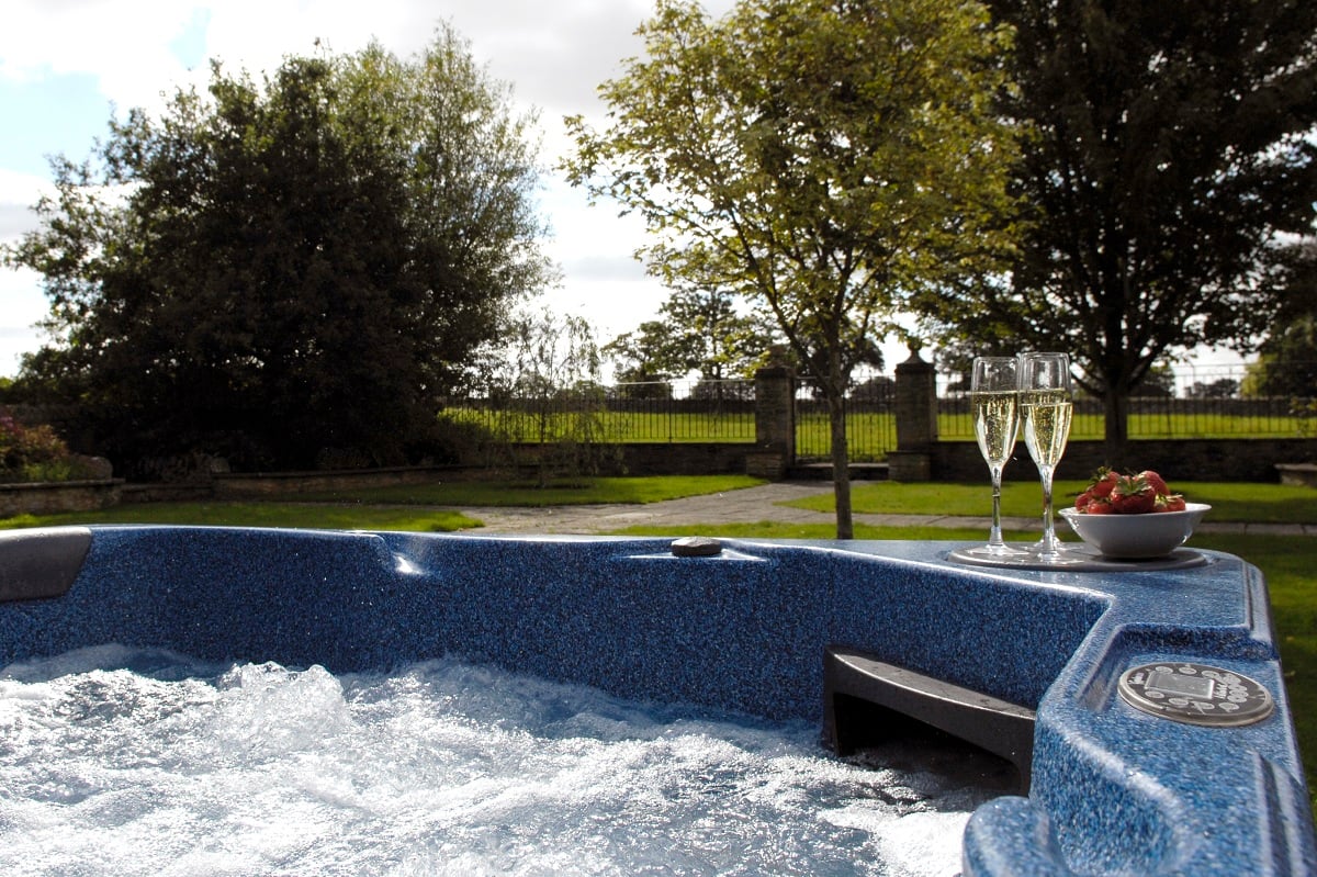 Exclusive use of a hot-tub in private lawns, with BBQ and picnic table.