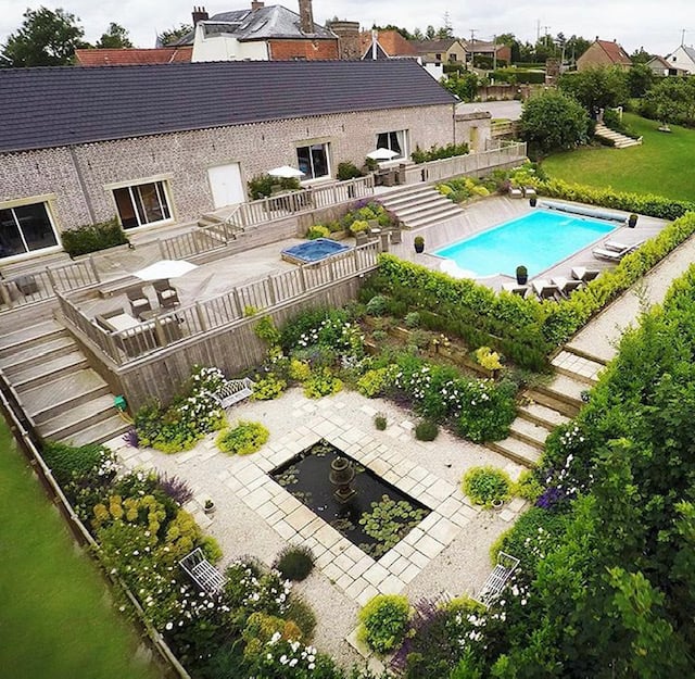 Back Garden with heated swimming pool and hot tub