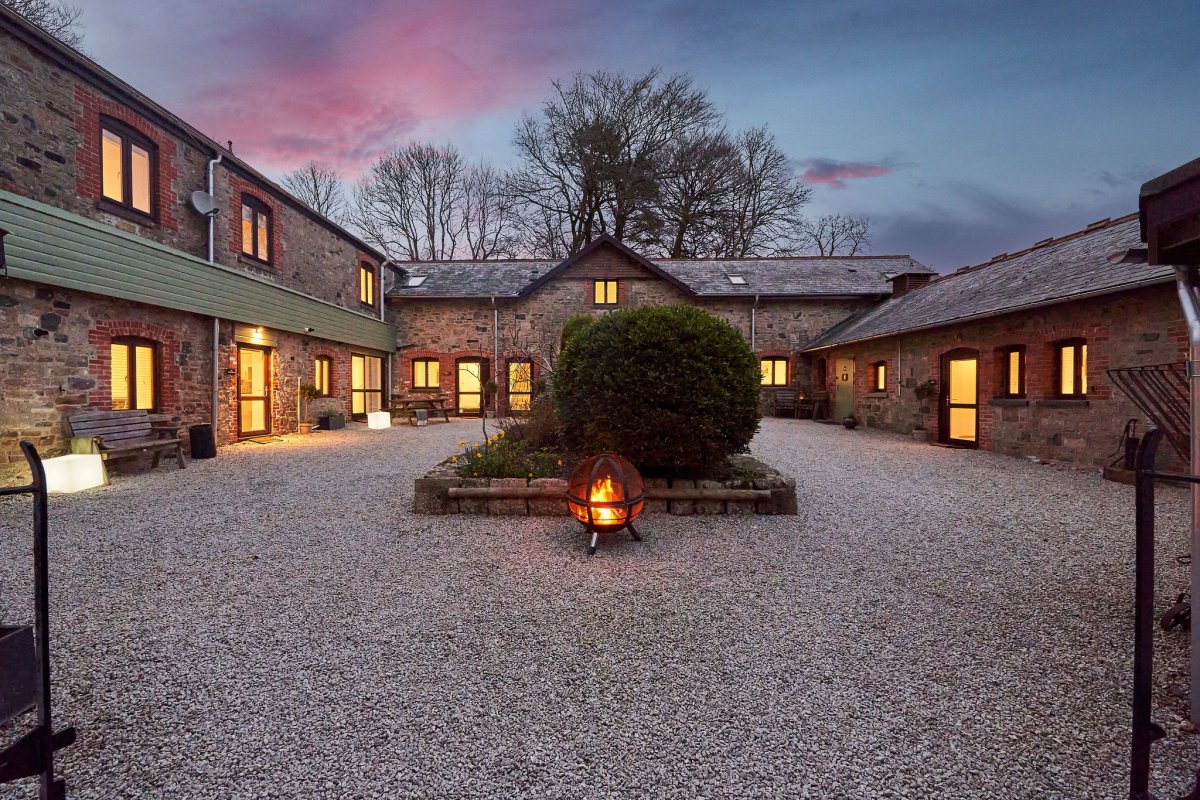 The Cottages at Blackadon Farm relax in our courtyard