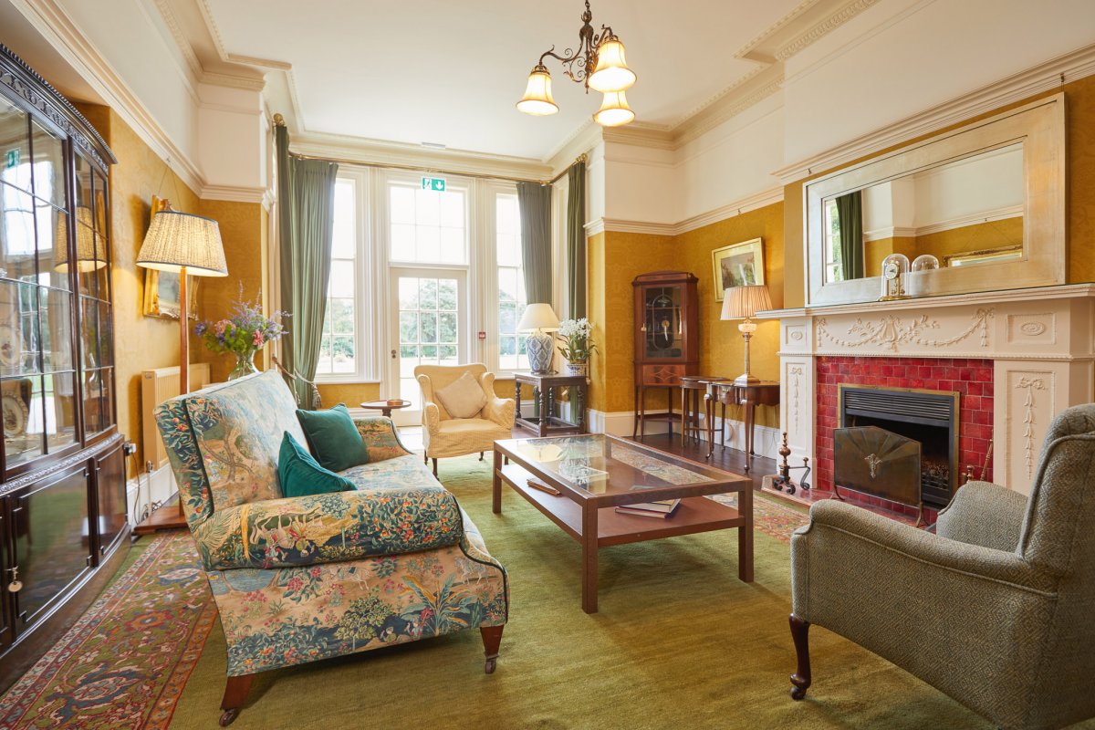 The drawing room is our largest sitting room seating 12 people