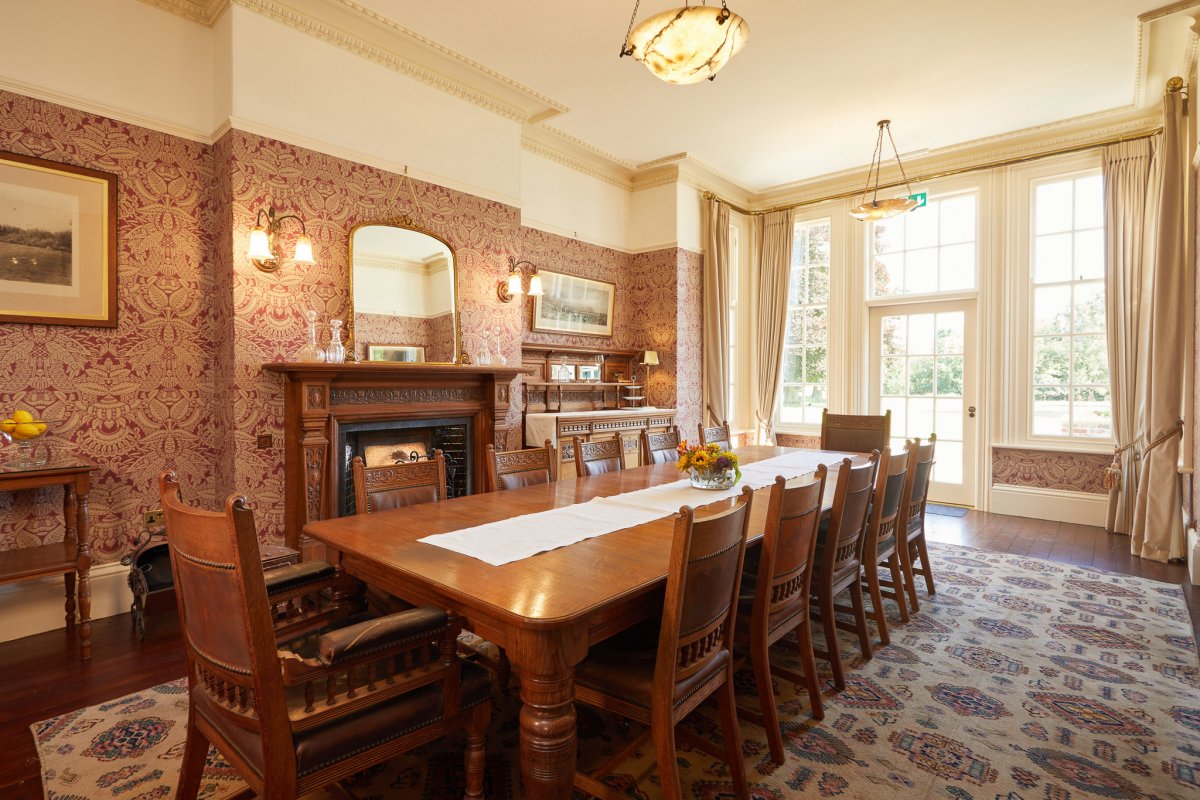 The dining room seating 18 people at Burtonfields Hall